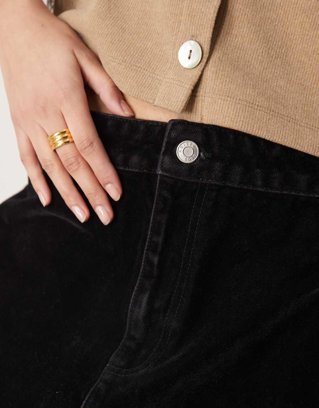 ASOS DESIGN flocked denim mini skirt in black Product Image