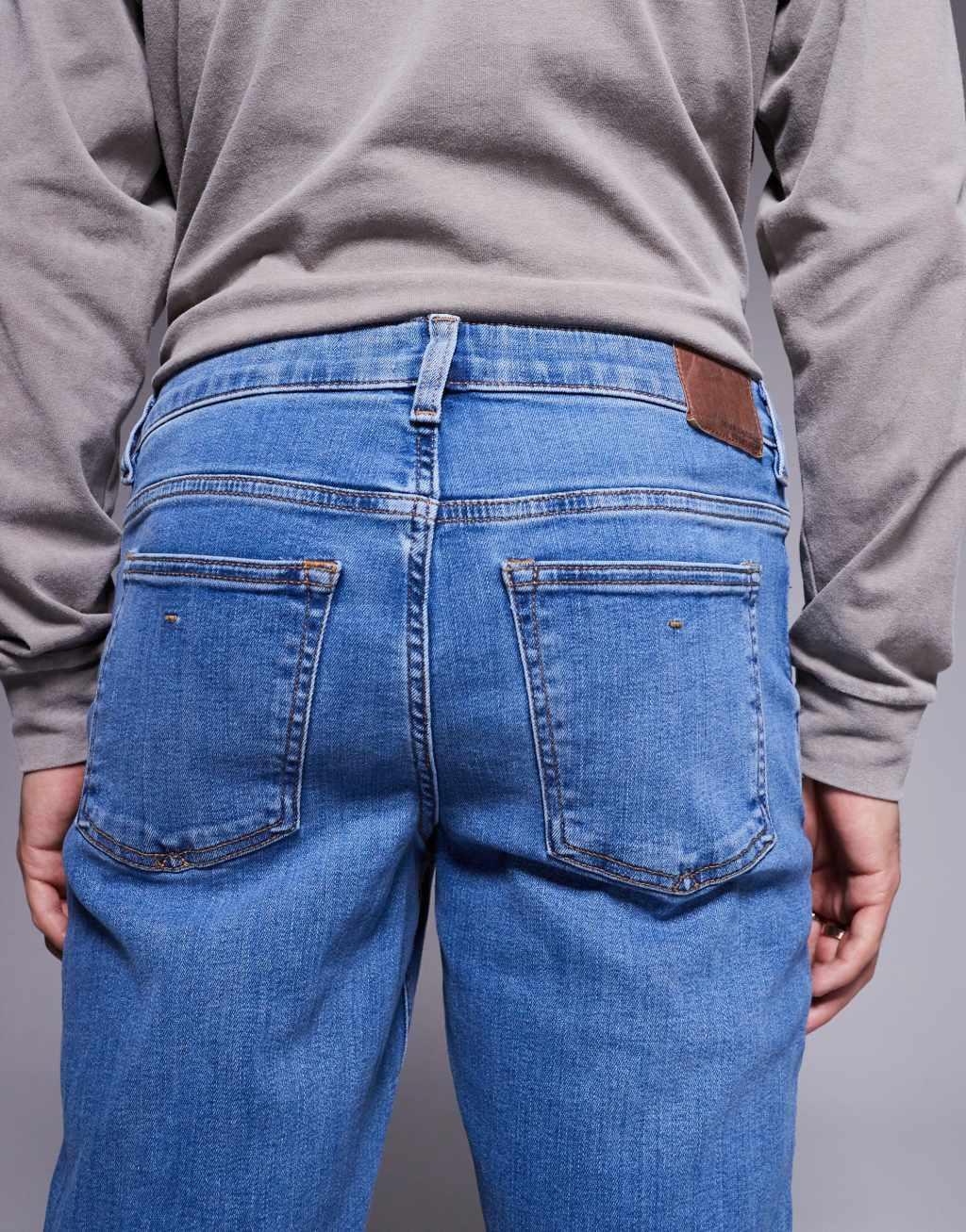 River Island slim fit jeans in medium blue Product Image