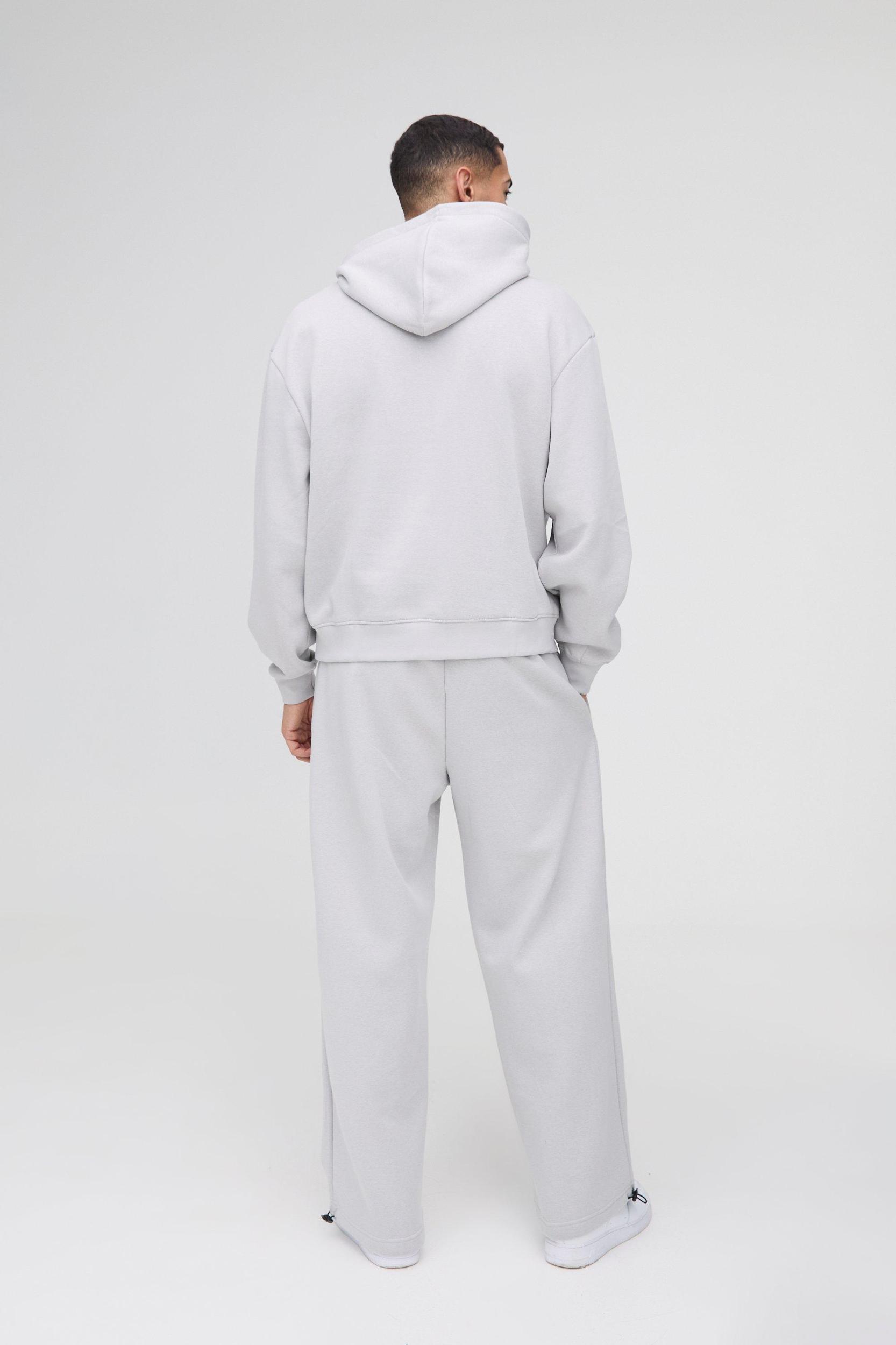 Oversized Boxy Hoodie & Wide Leg Tie Cuff Tracksuit | boohooMAN USA Product Image