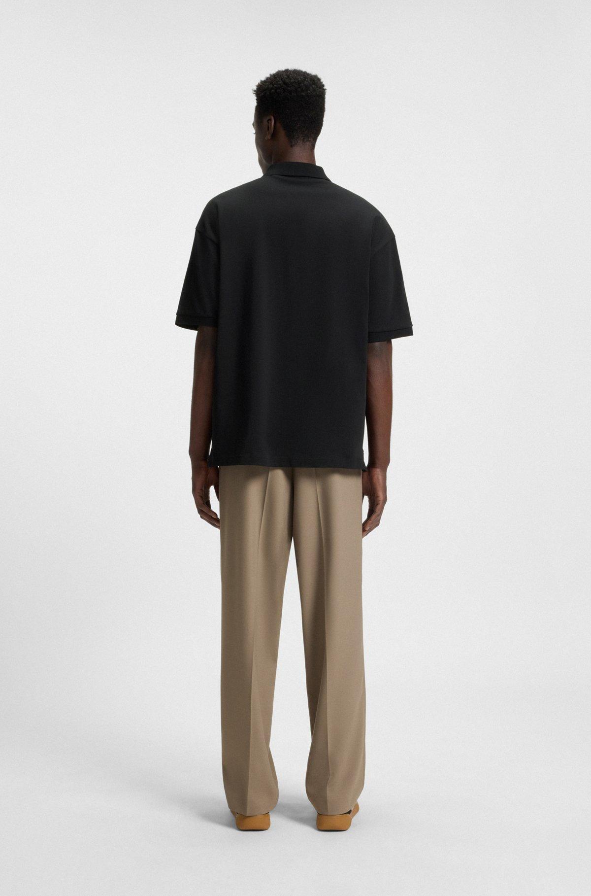 Oversize-fit cotton polo shirt with tonal logo print Product Image