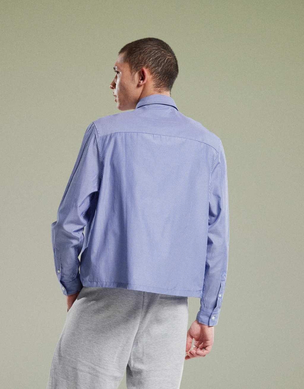 ASOS DESIGN boxy relaxed striped shirt with chest embroidery in blue Product Image