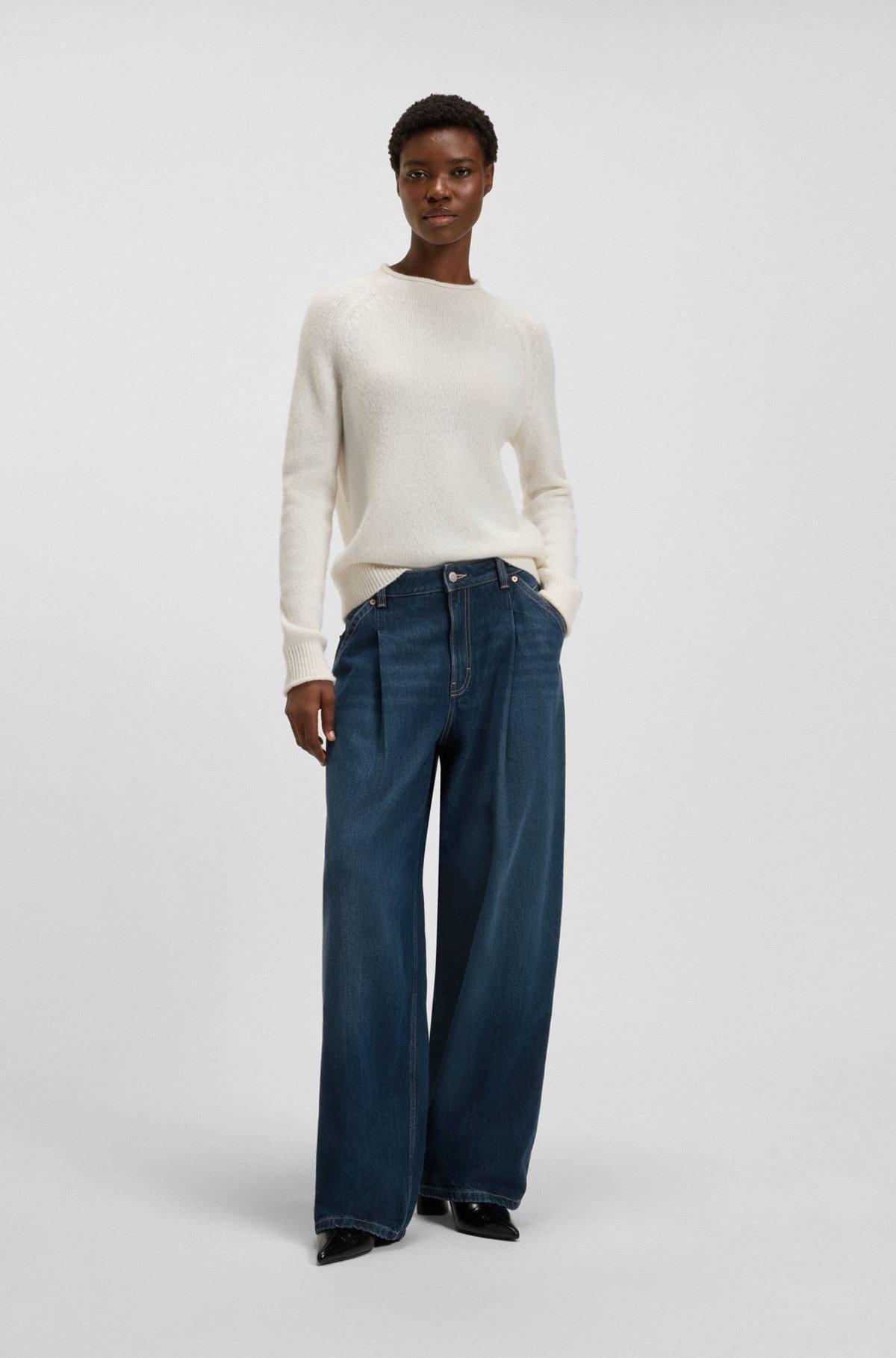 Wide-leg jeans with front pleats Product Image