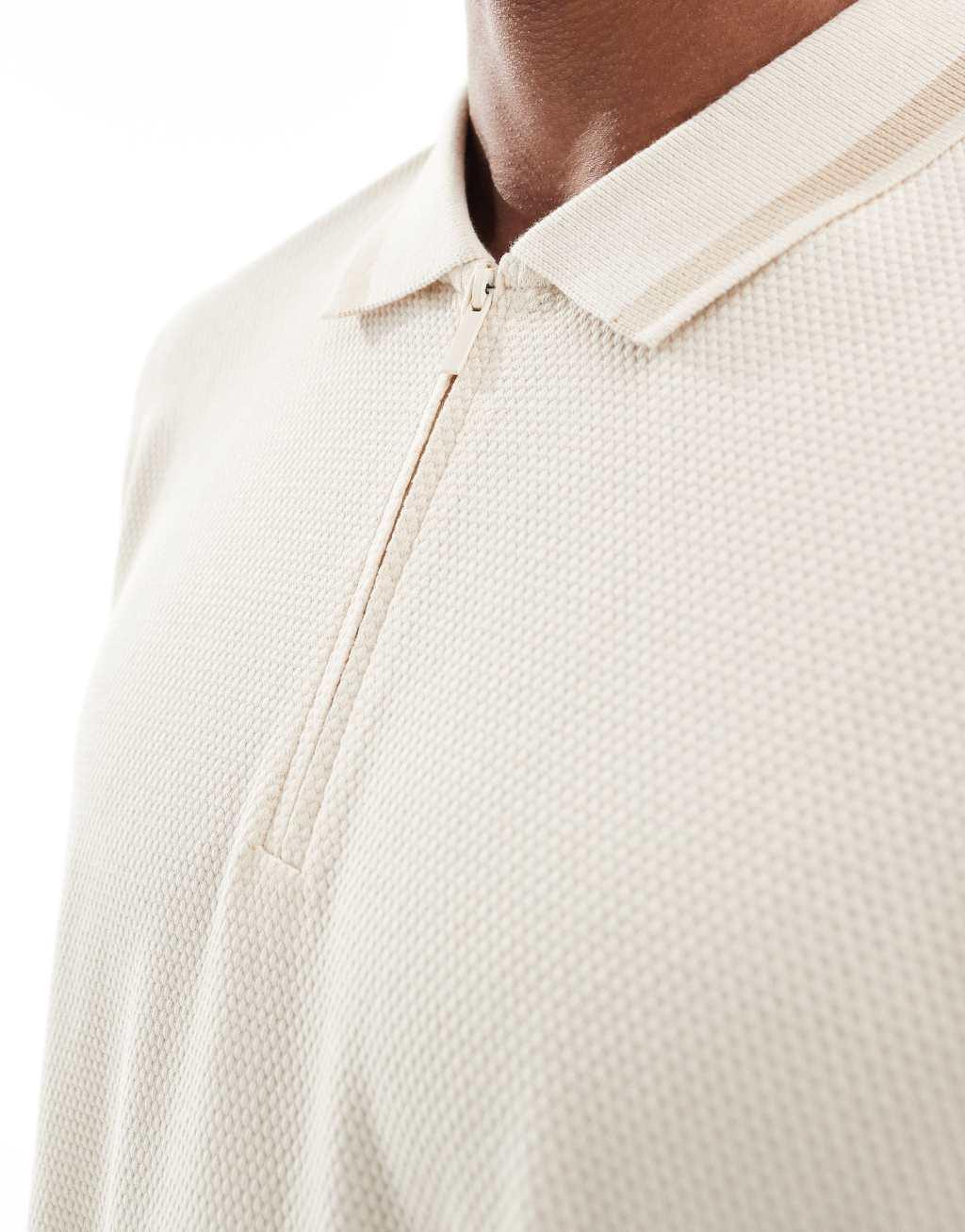 Threadbare pique striped polo shirt in beige Product Image