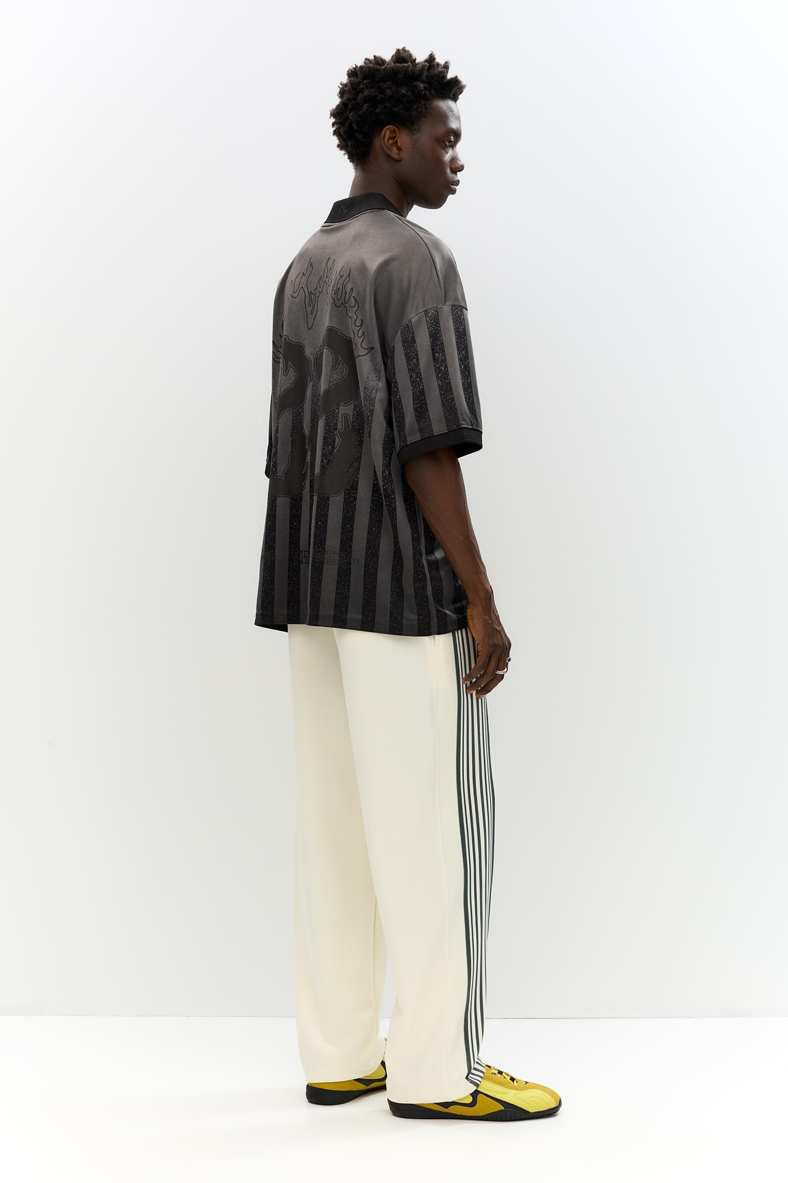STWD tracksuit bottoms with side stripes Product Image