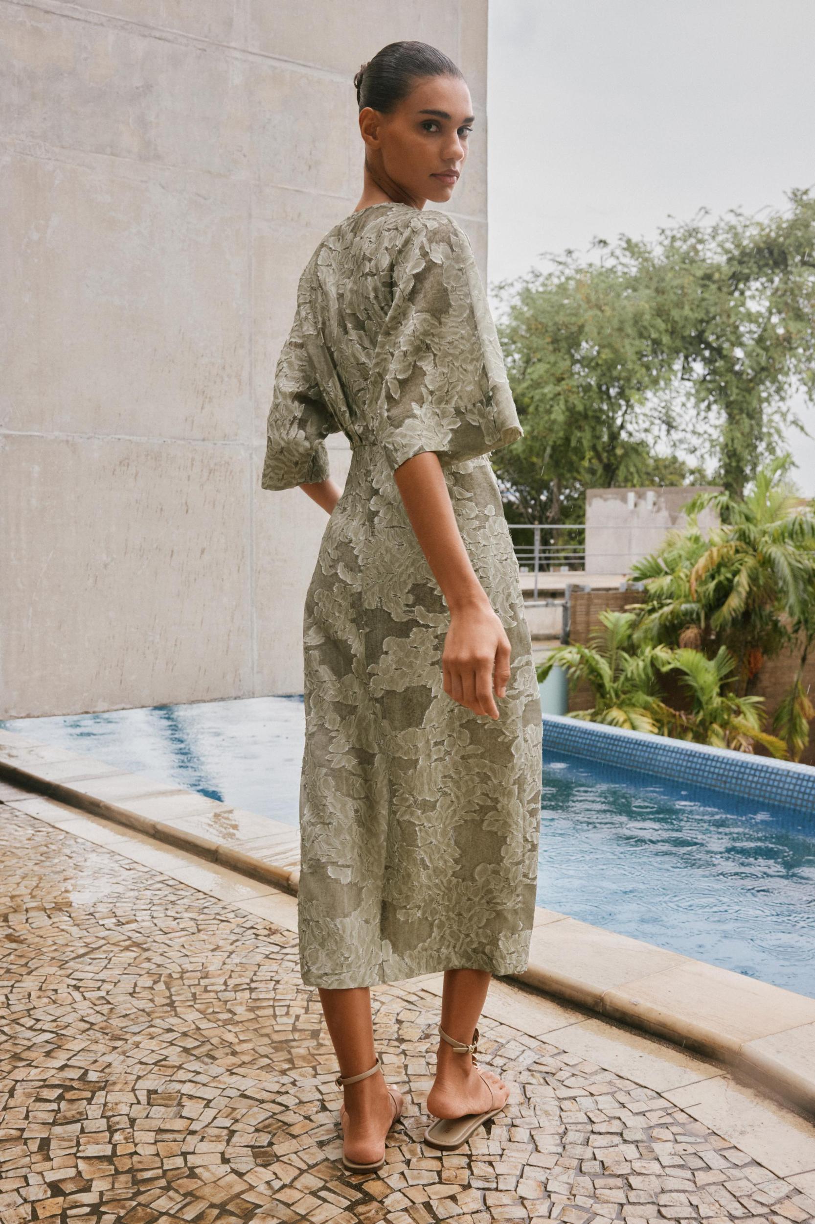 TEXTURED DRAPED DRESS Product Image