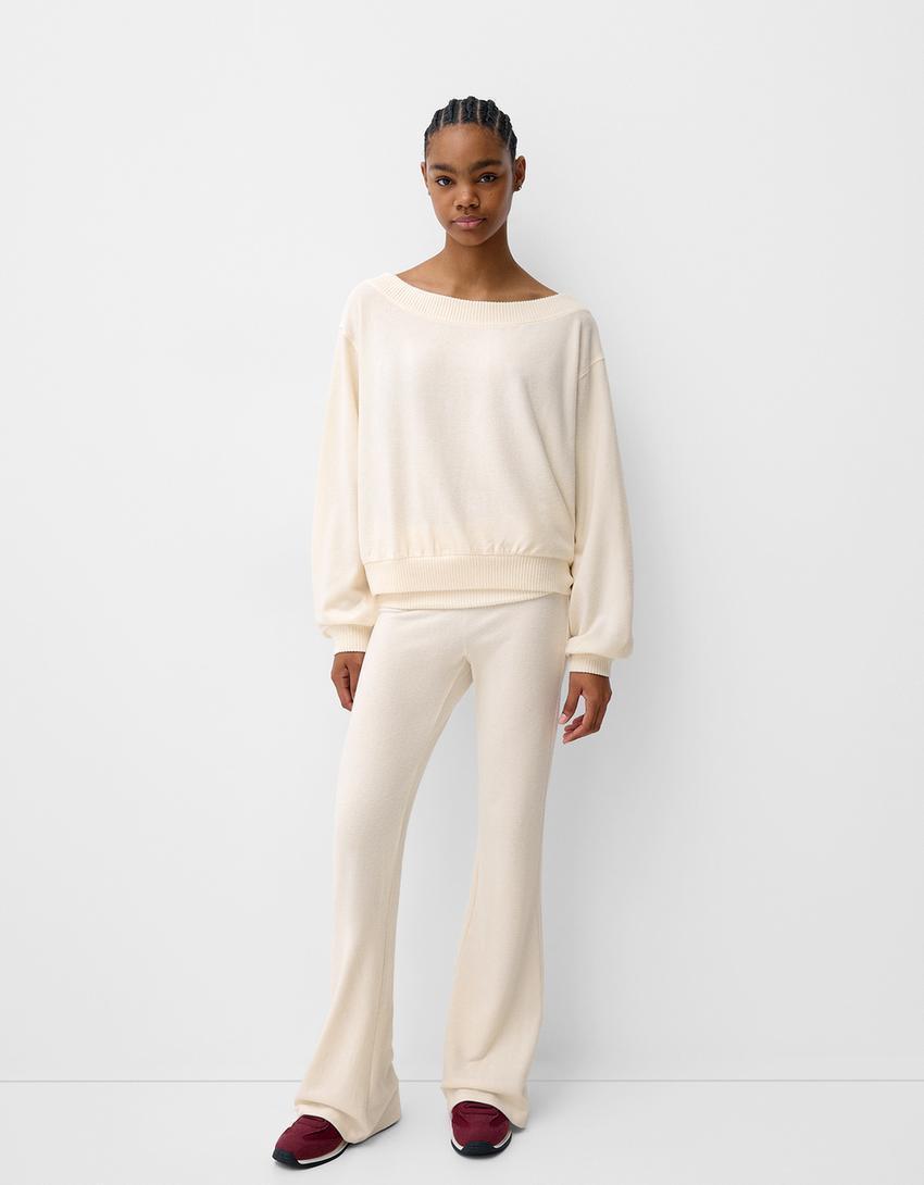Soft touch flared pants with fold-over waist Product Image