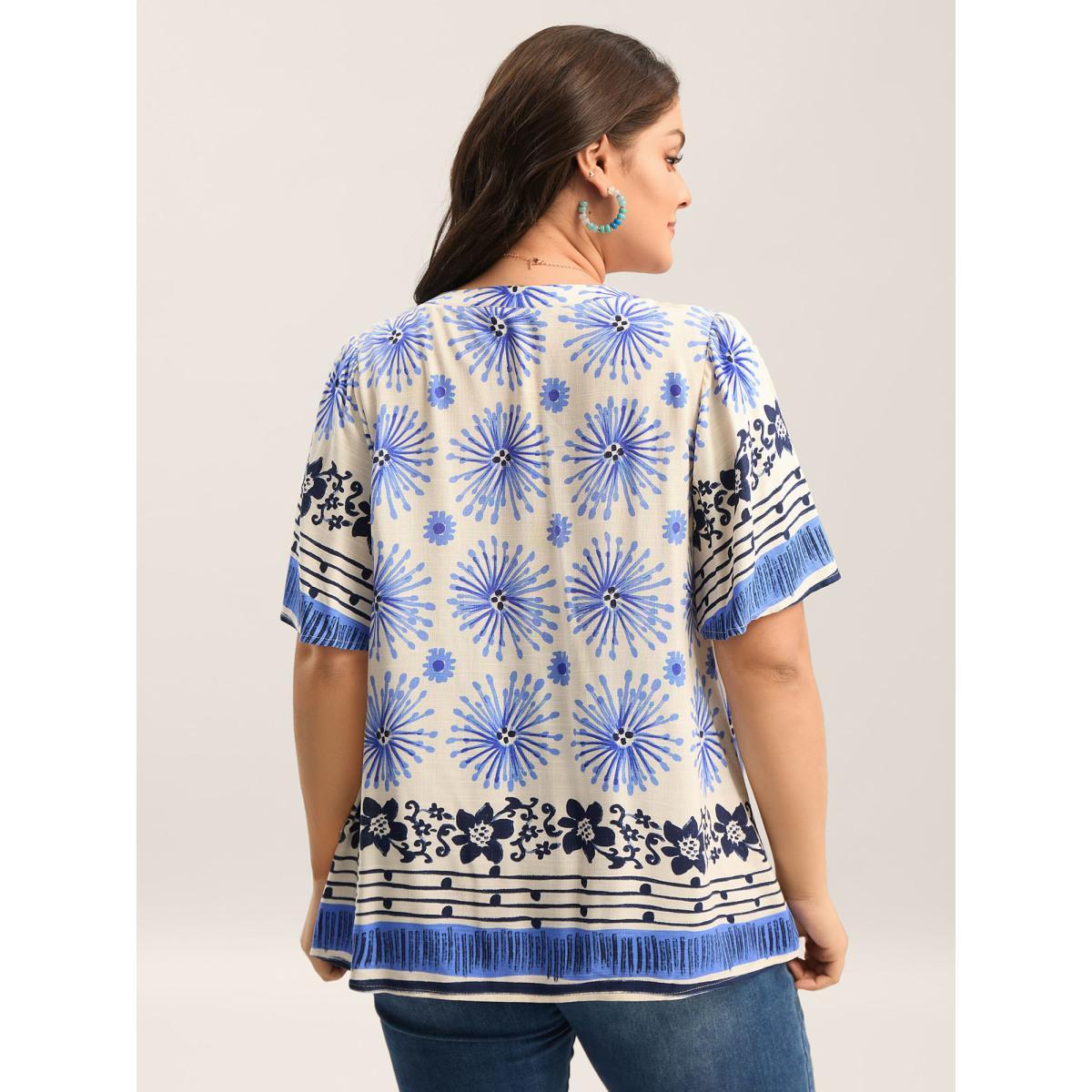 Plus Size Skyblue Floral Symphony Print Split Neck Blouse Women Short sleeve Notched collar Vacation Blouses BloomChic 28/5X Product Image
