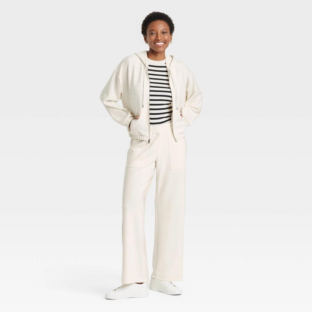Women's Sandwash Hooded Zip-Up Sweatshirt - A New Day™ Cream S: Modal Blend, Recycled Polyester, Spandex, Kangaroo Pocket Product Image