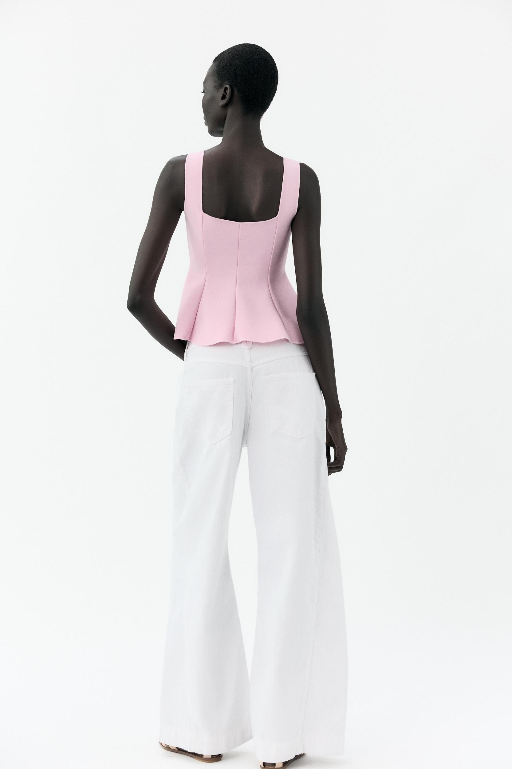 STRETCH PEPLUM VEST TOP Product Image
