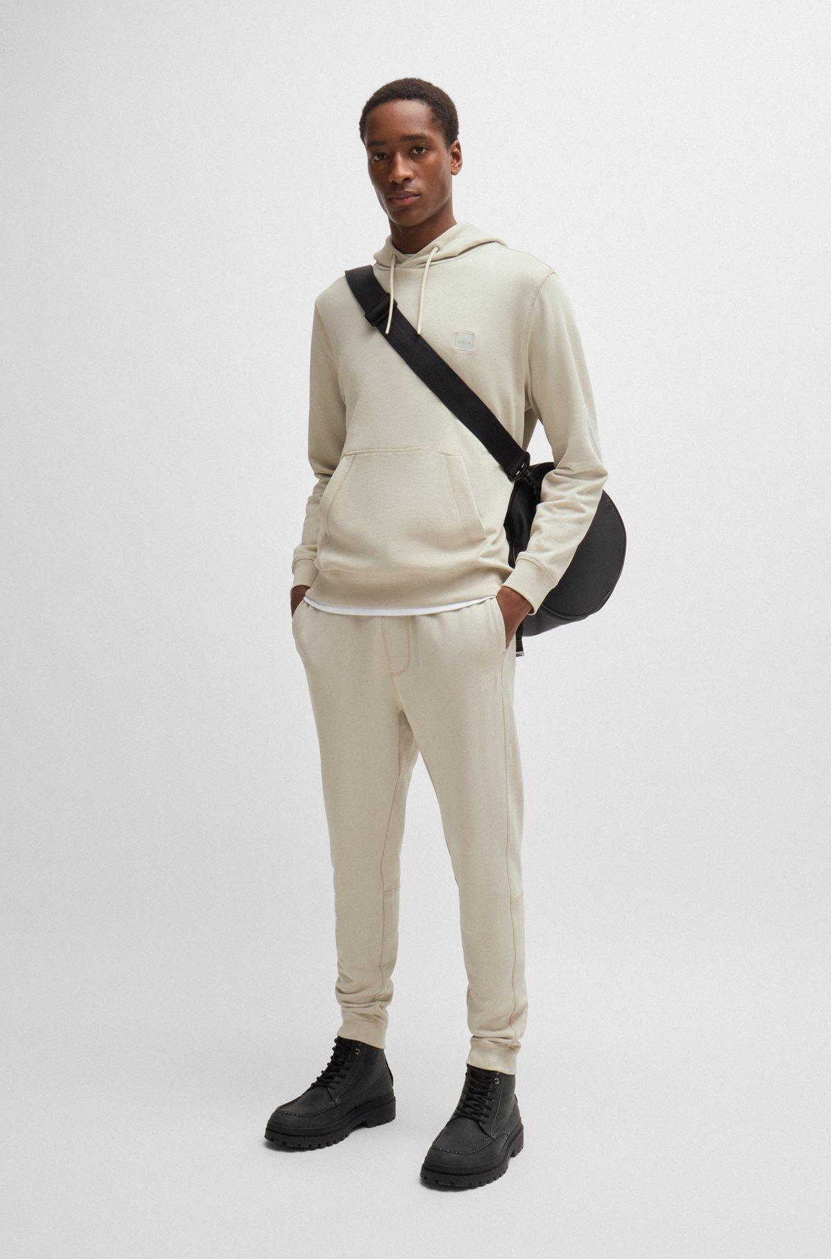 Cotton-terry tracksuit bottoms with logo patch Product Image
