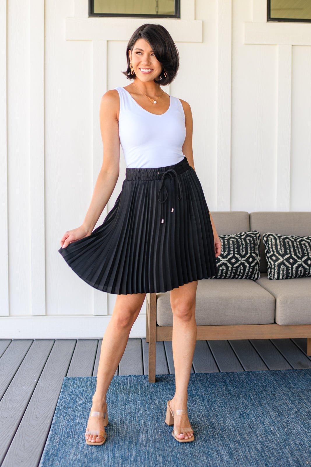 Just a Flirt Pleated Skirt in Black Product Image