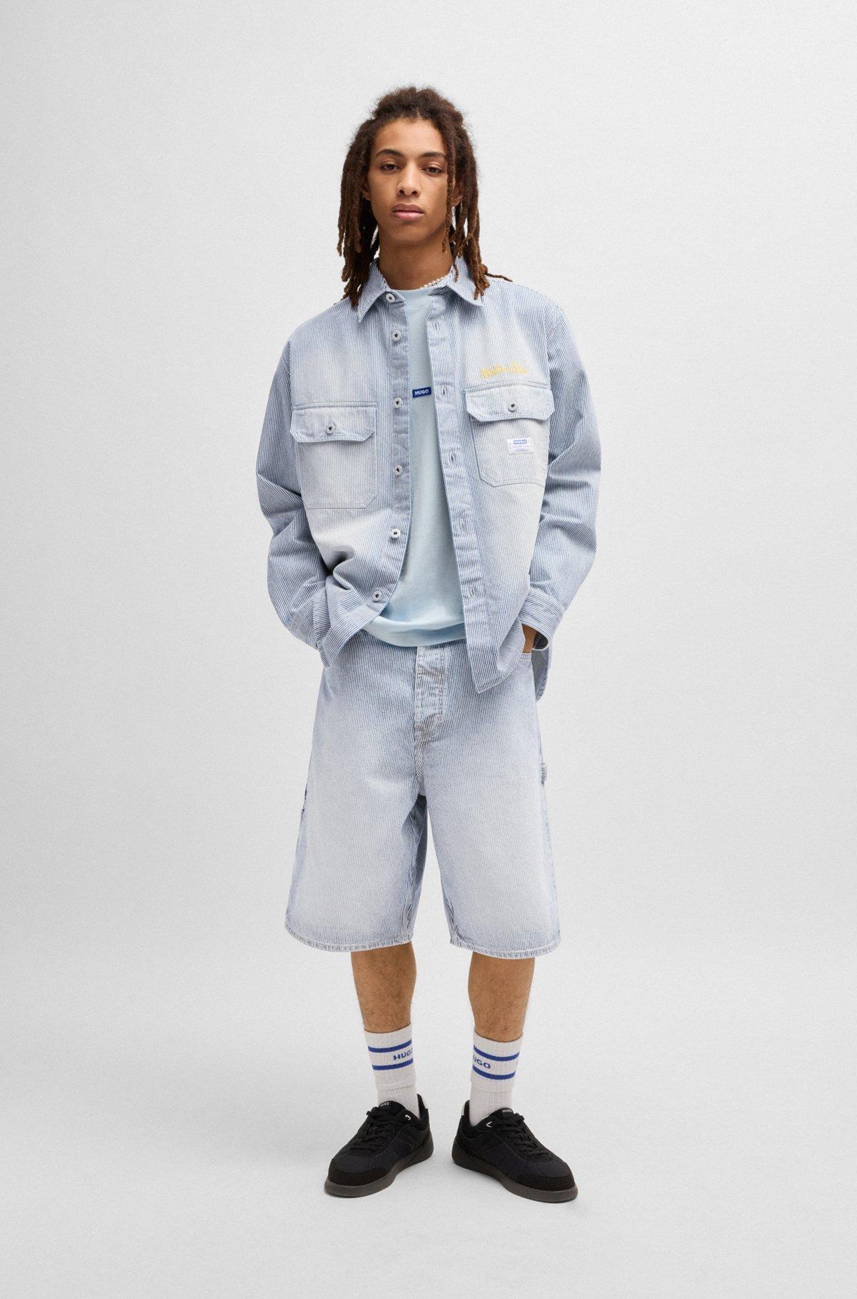 Wide-leg shorts in striped blue denim Product Image