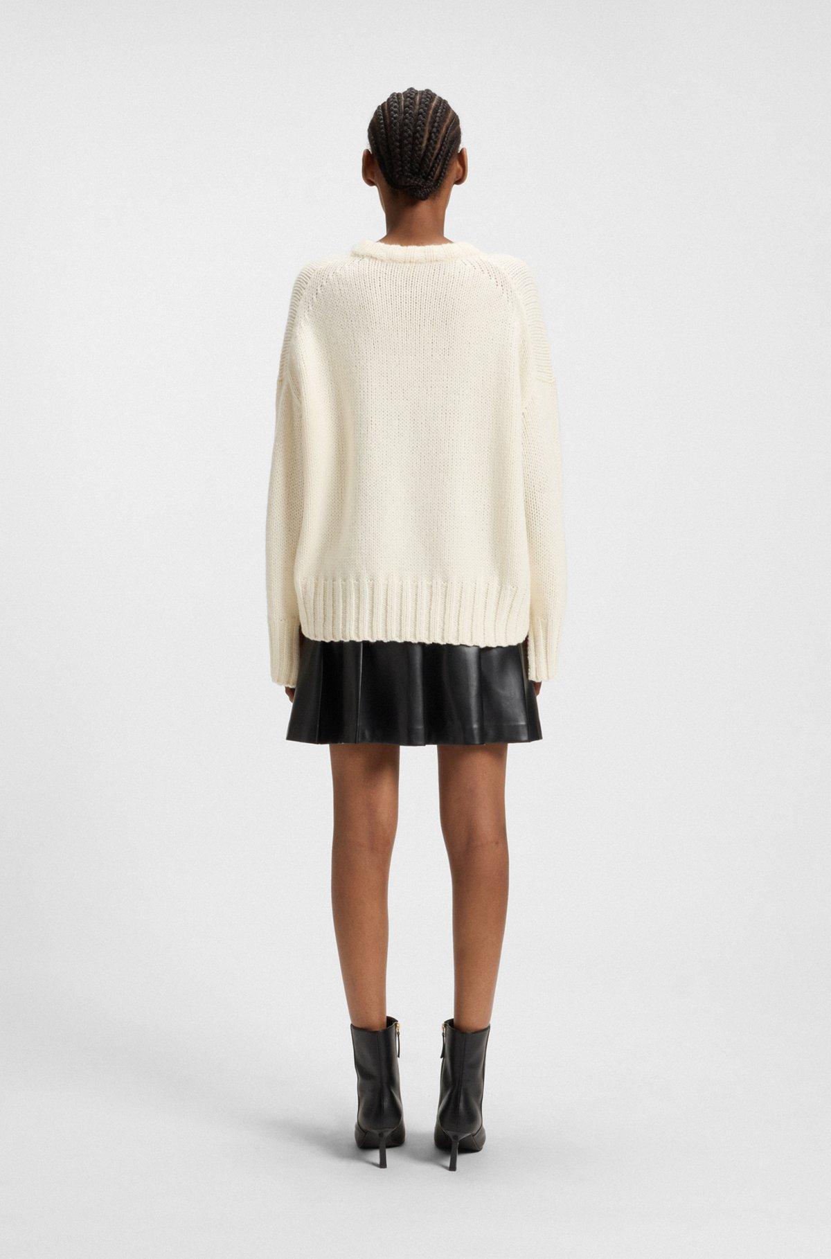 Oversize-fit knitted sweater with embroidered logo Product Image