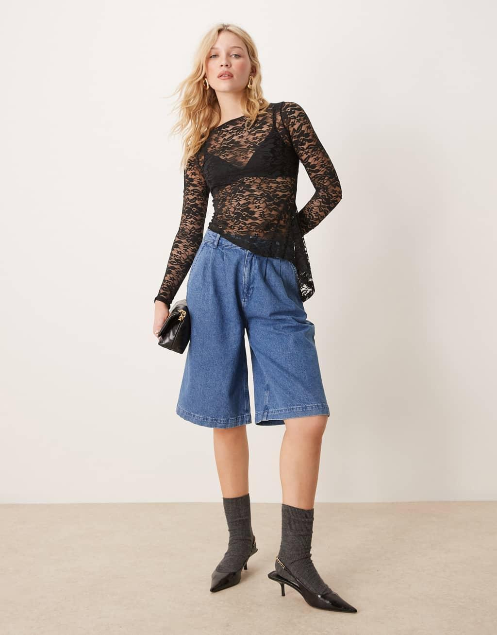 ASOS DESIGN long sleeve lace top with ruffle godet detail in black Product Image