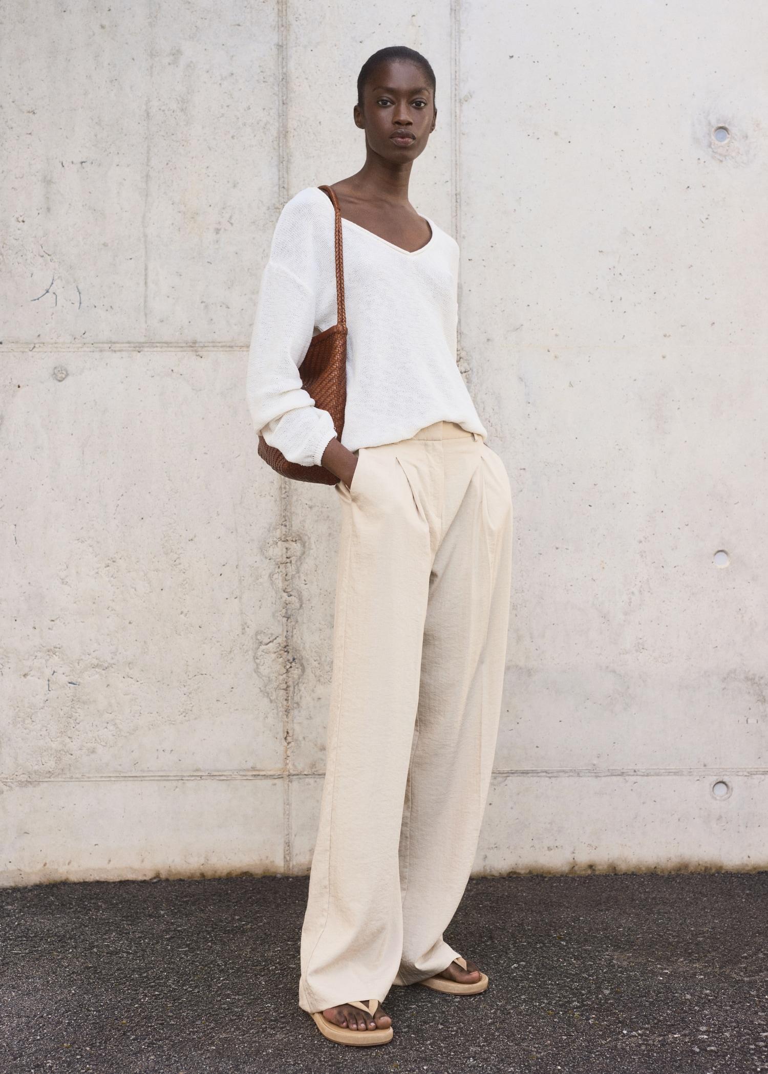 Wide-leg pleated pants - Women | MANGO USA Product Image