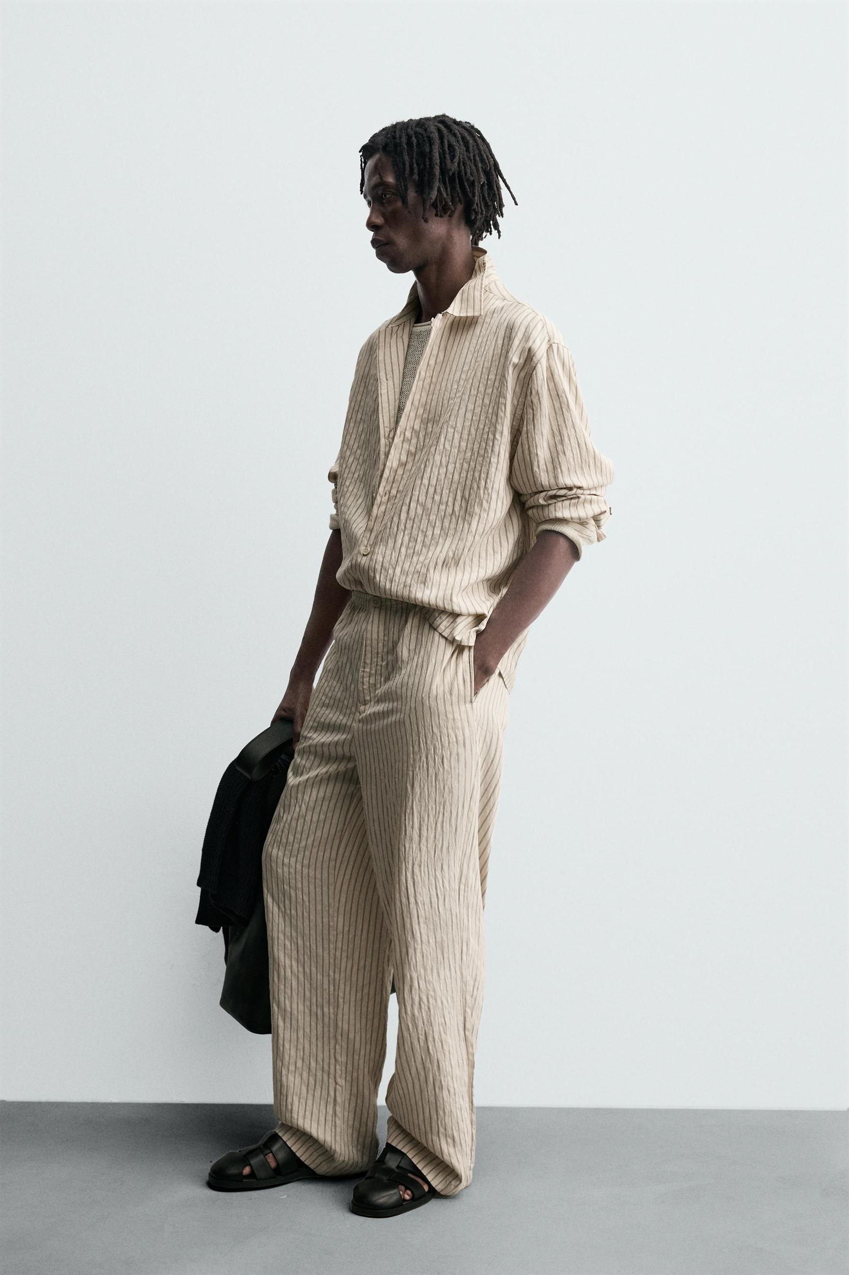 WRINKLED EFFECT STRIPED FLOWY PANTS Product Image