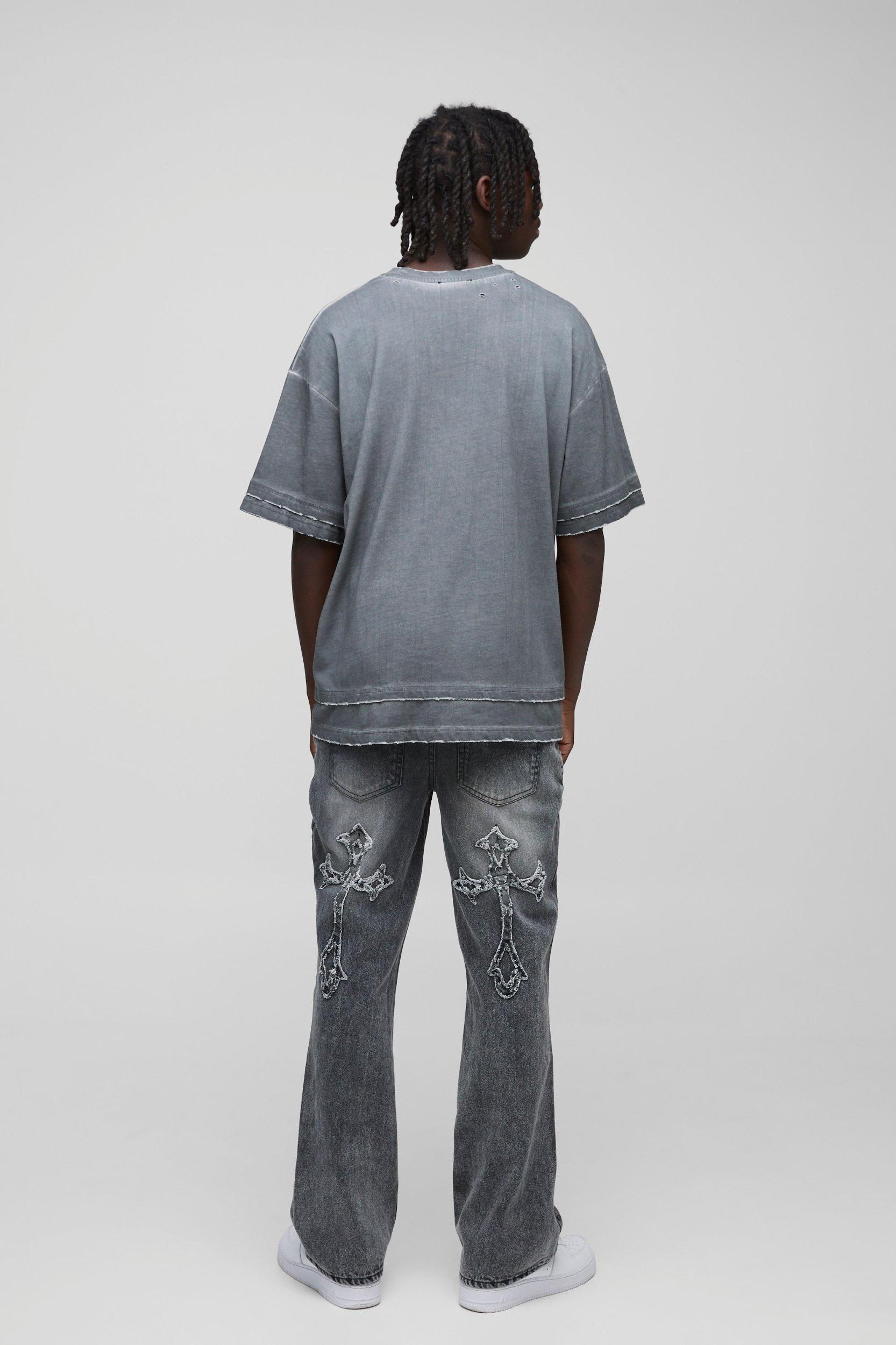 Slim Flared Acid Wash Cross Applique Gusset Jeans | boohooMAN USA Product Image