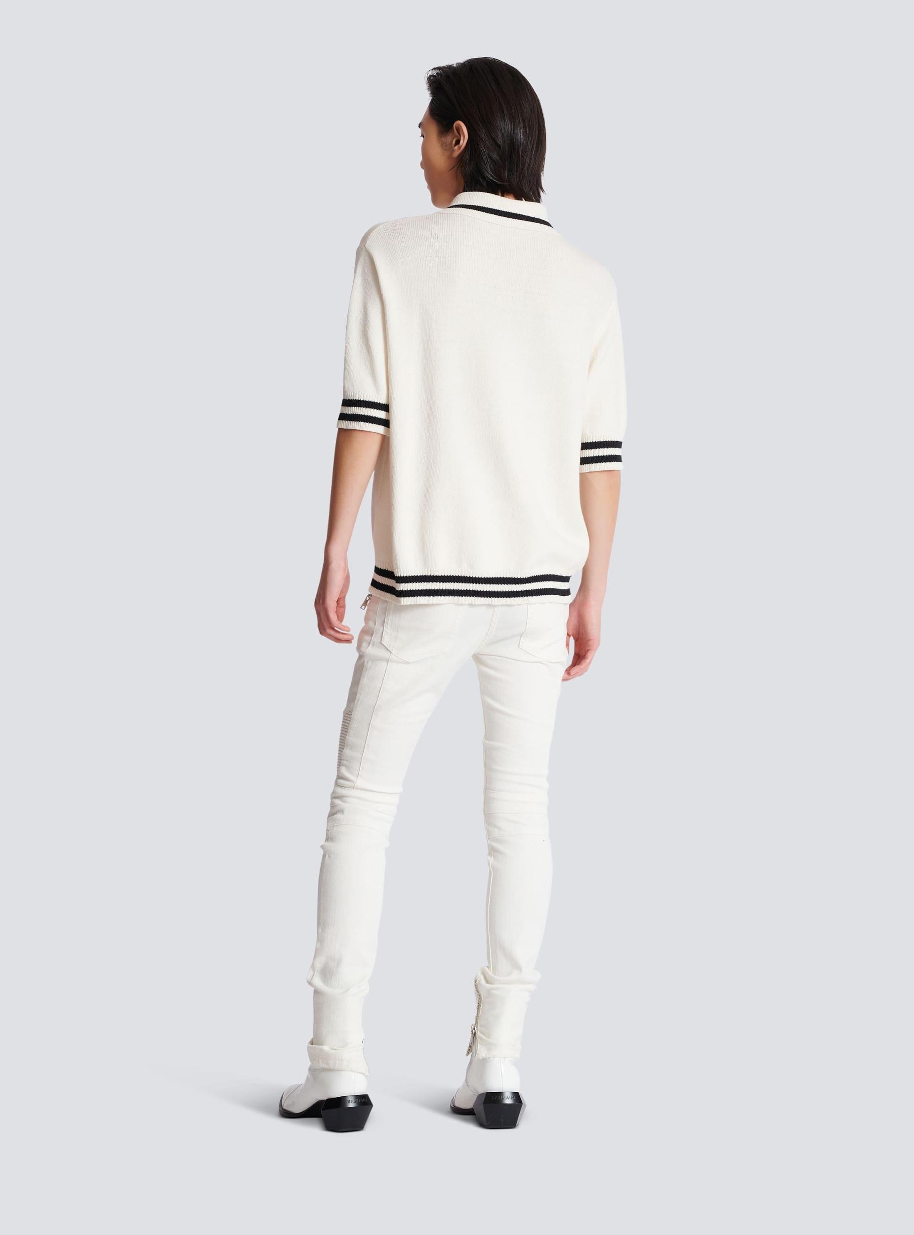 Wool polo shirt with Balmain Signature embroidery Product Image