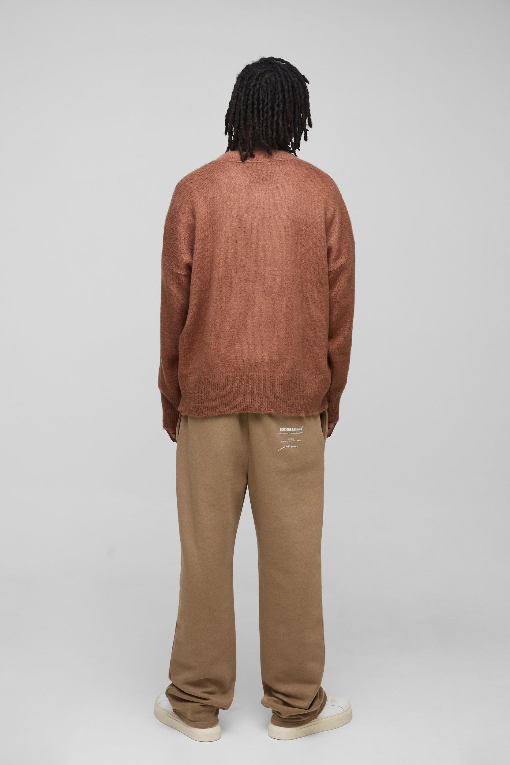 Oversized Dropped Shoulder Fluffy V Neck Knit Sweater | boohooMAN USA Product Image