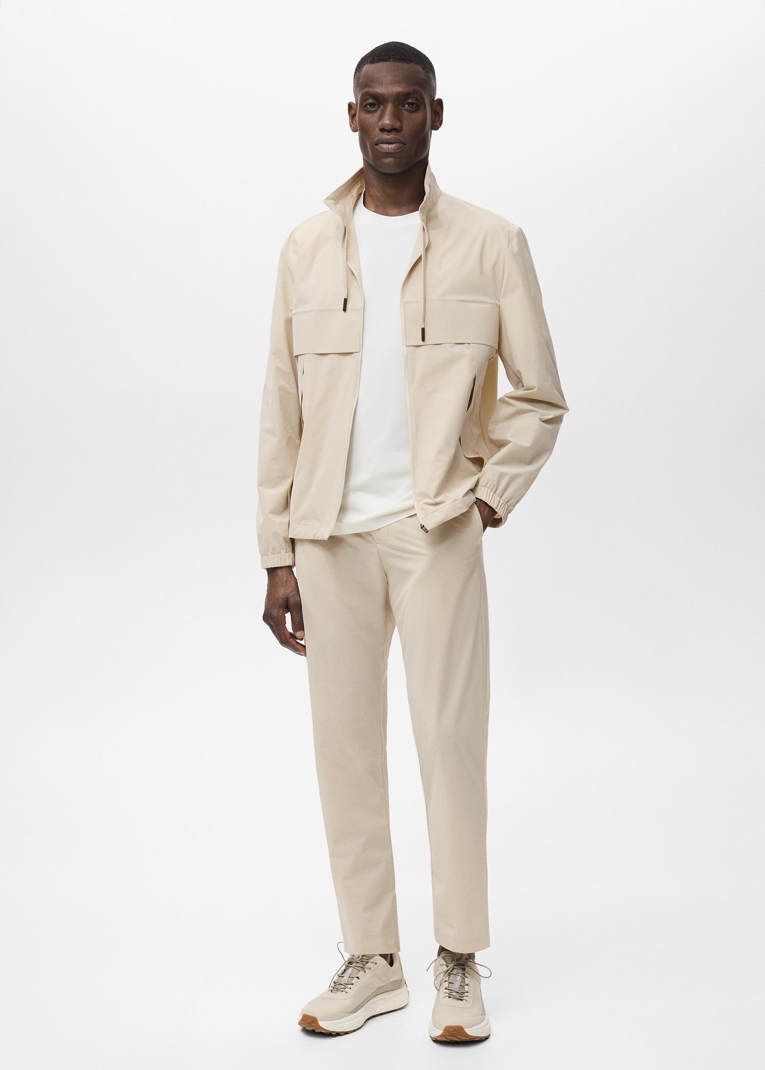 Slim-fit water-repellent pants - Men | MANGO USA Product Image