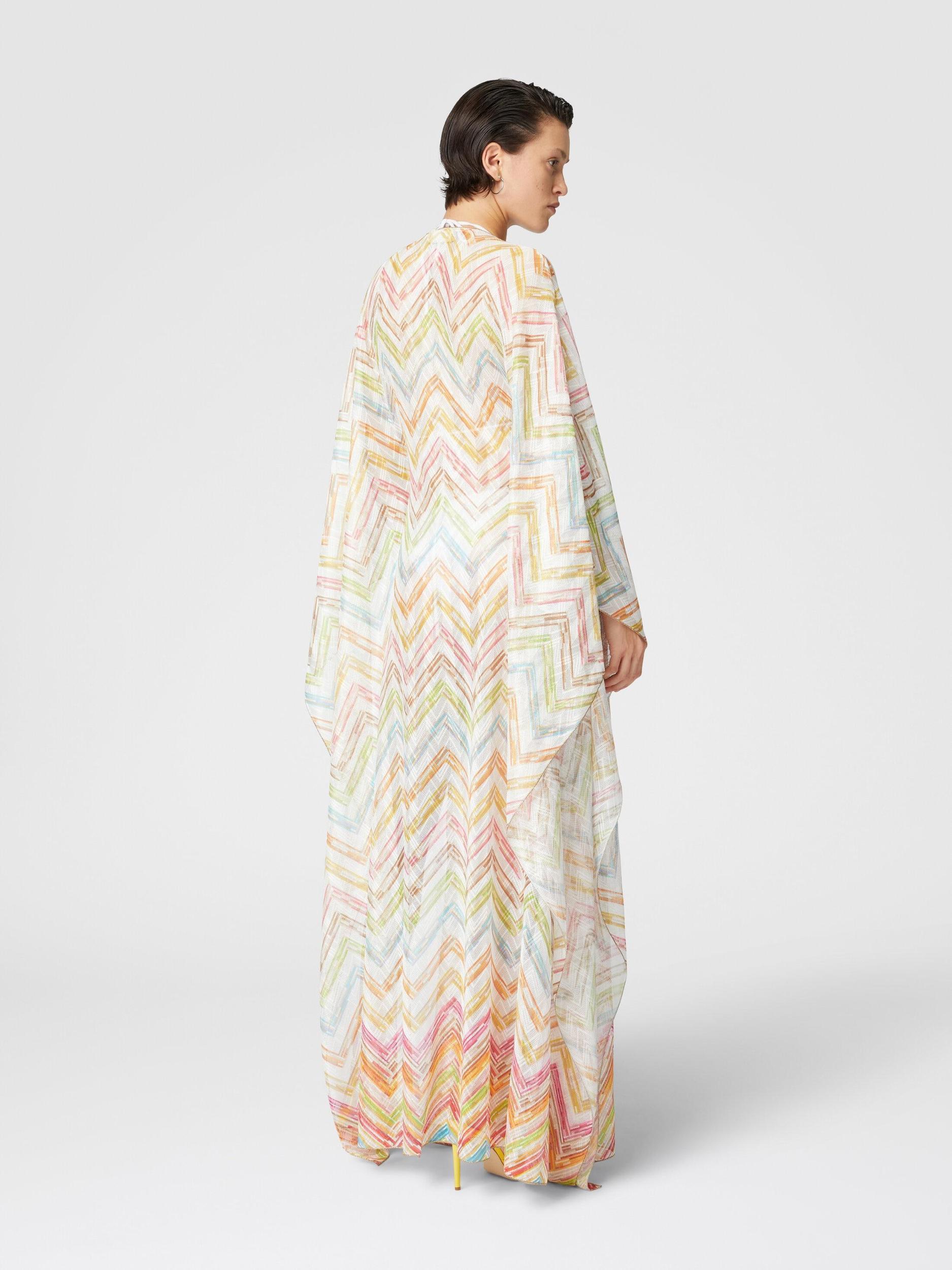 Long covered up in printed tulle with batwing sleeves Product Image
