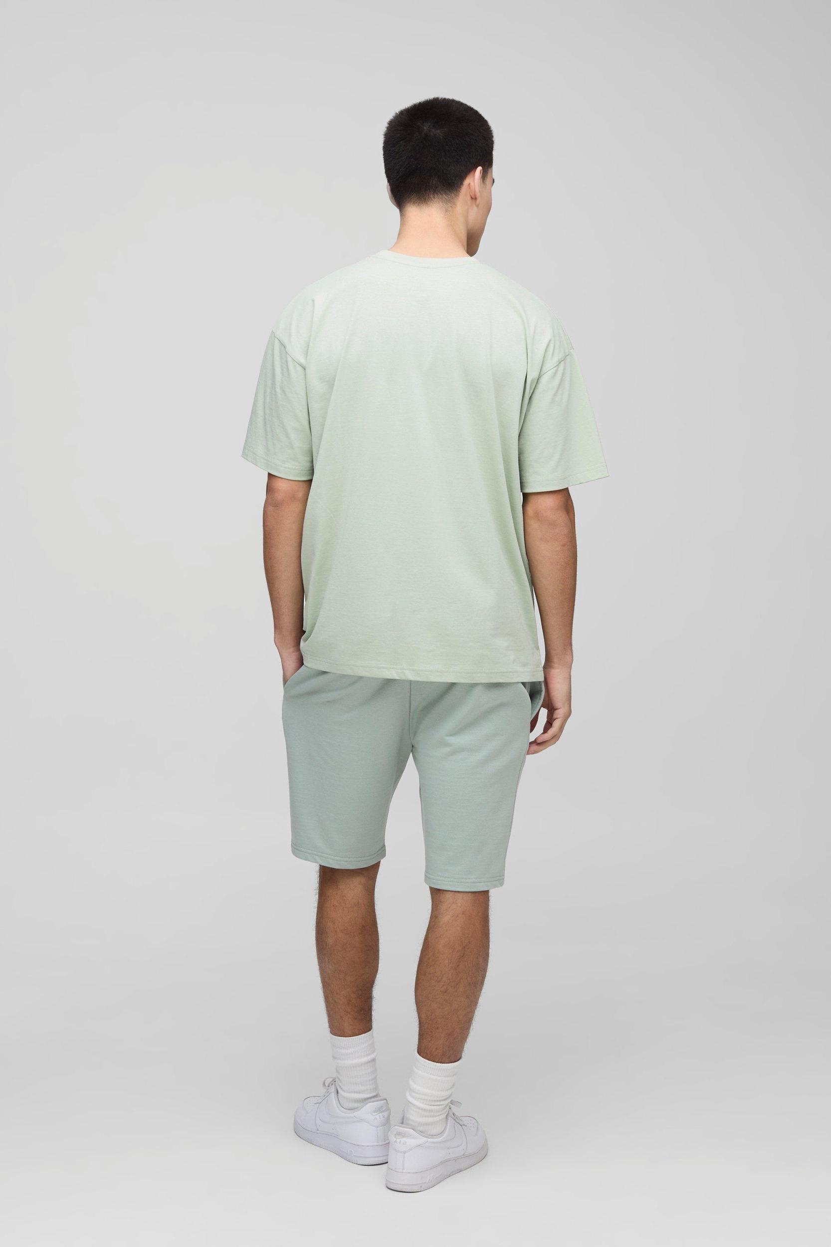 260GSM Loopback Basic Slim Fit Mid Length Shorts | boohooMAN USA Product Image