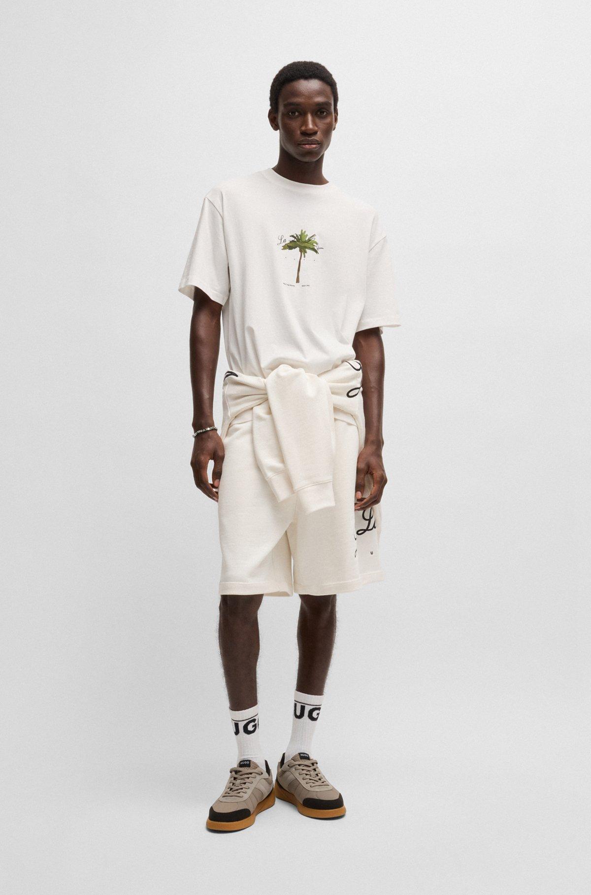 Cotton-jersey T-shirt with palm-tree print Product Image