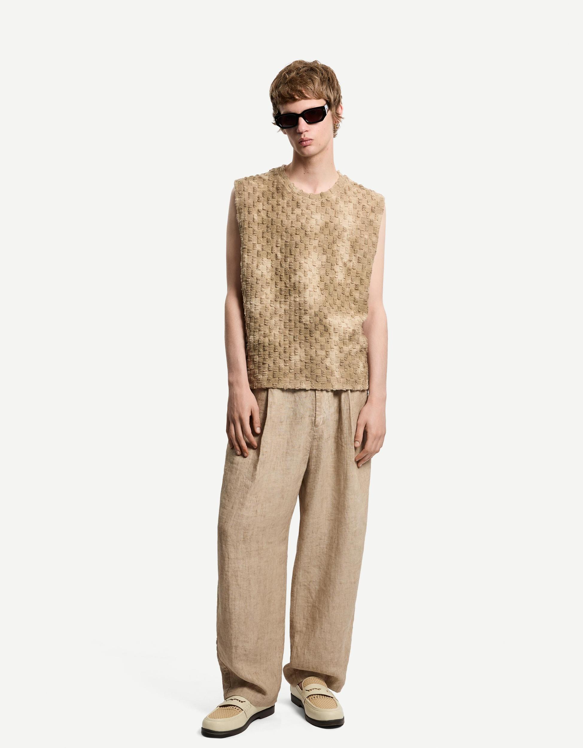 Faded-effect textured vest Product Image