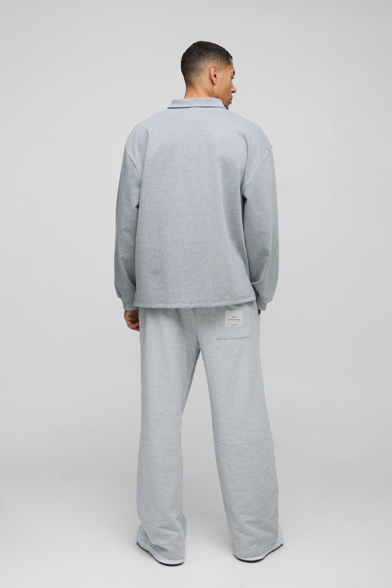 Oversized Worldwide Applique Half Zip Rugby Polo | boohooMAN USA Product Image