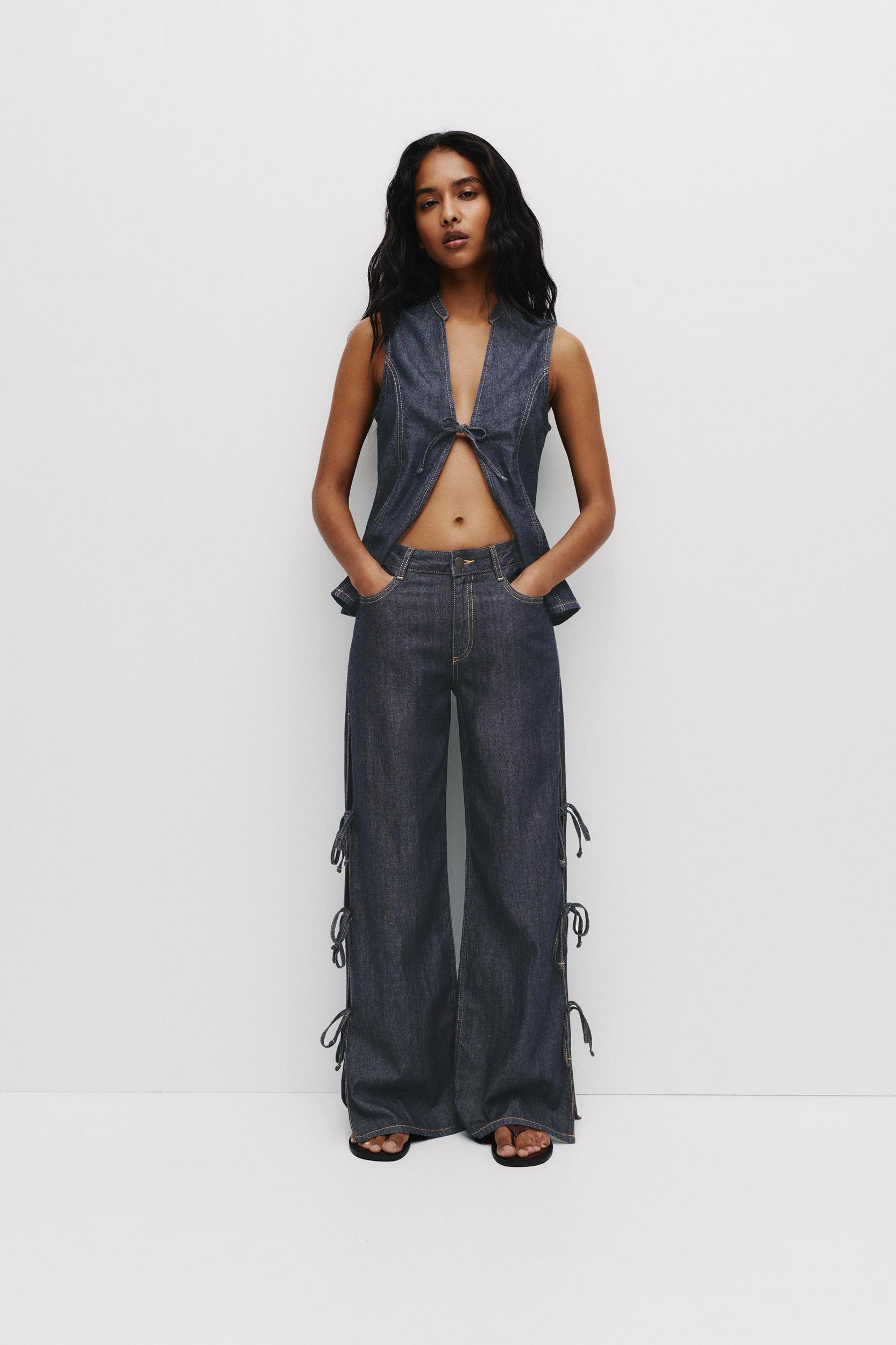 Wide-leg jeans with bows Product Image