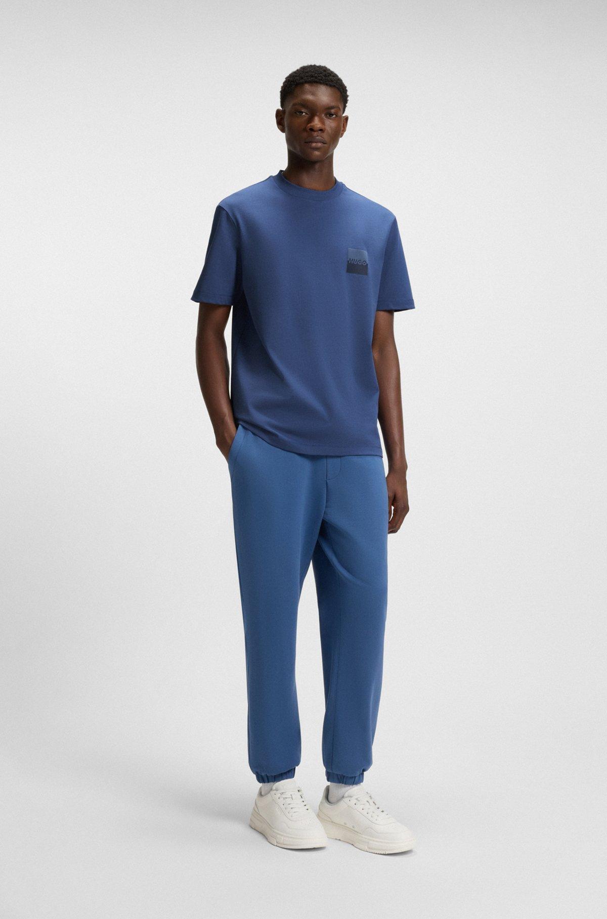 HUGO - Relaxed-fit T-shirt in cotton with split logos - Blue Product Image