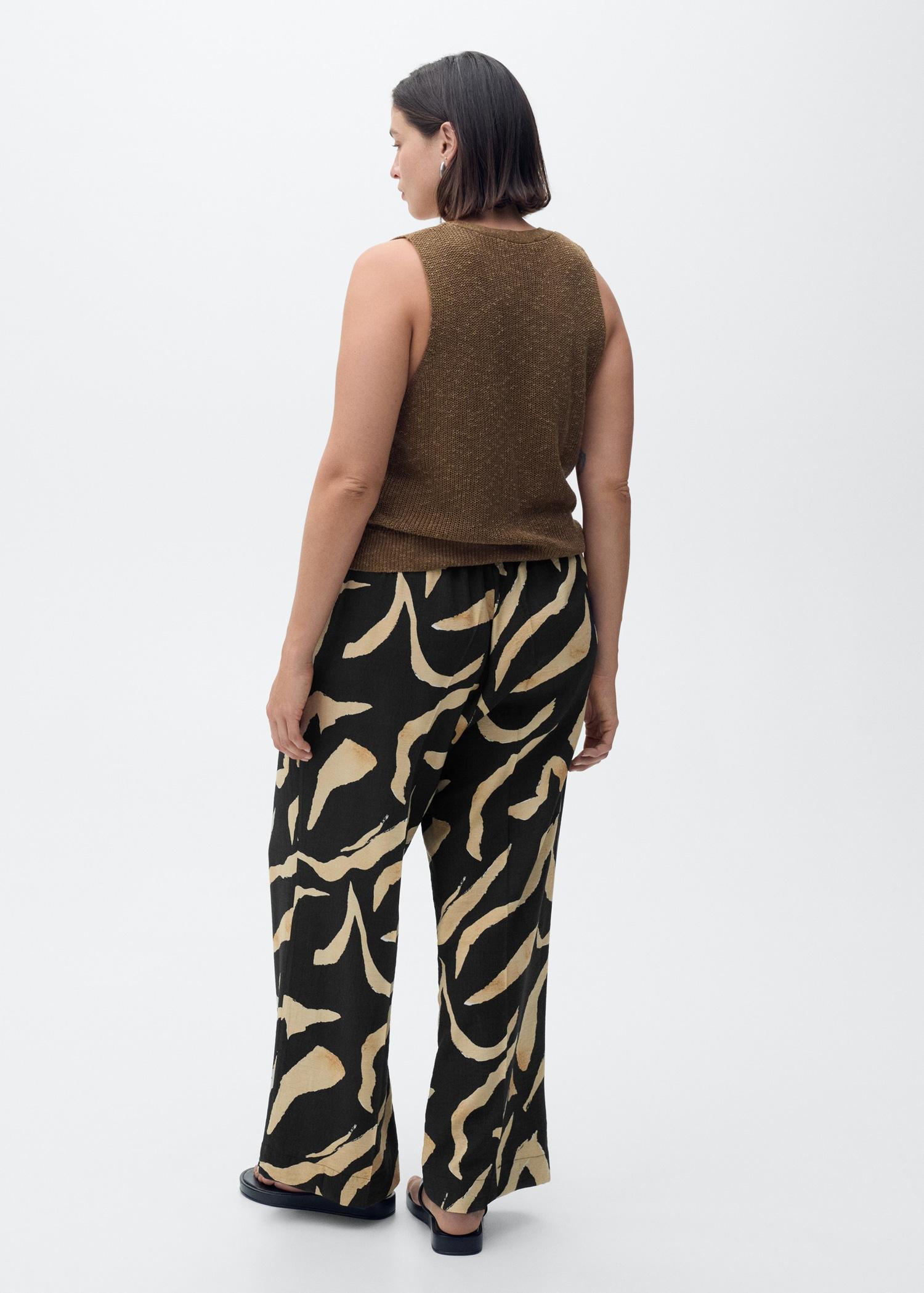 Printed straight-fit pants with belt - Women | MANGO USA Product Image