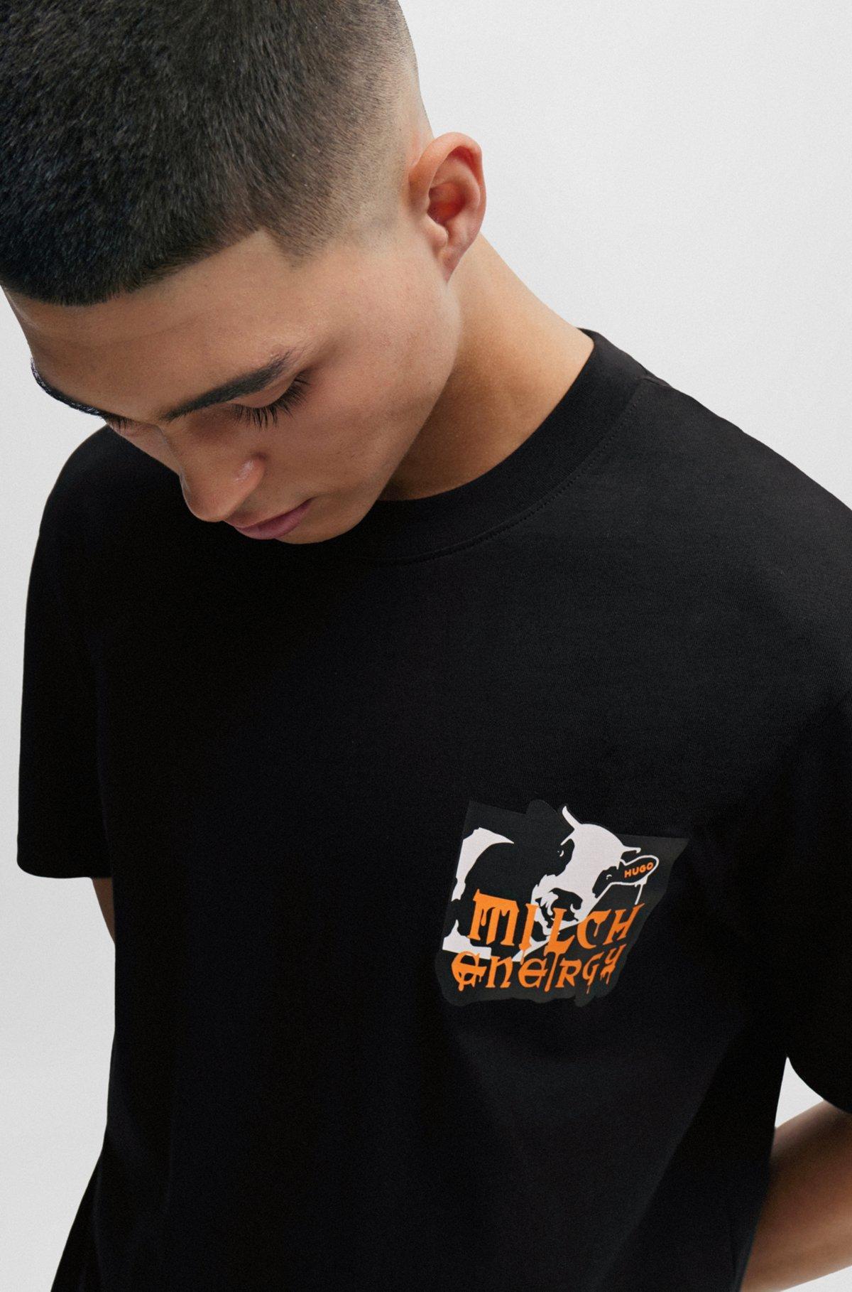 HUGO - Relaxed-fit T-shirt in with seasonal artwork - Black Product Image