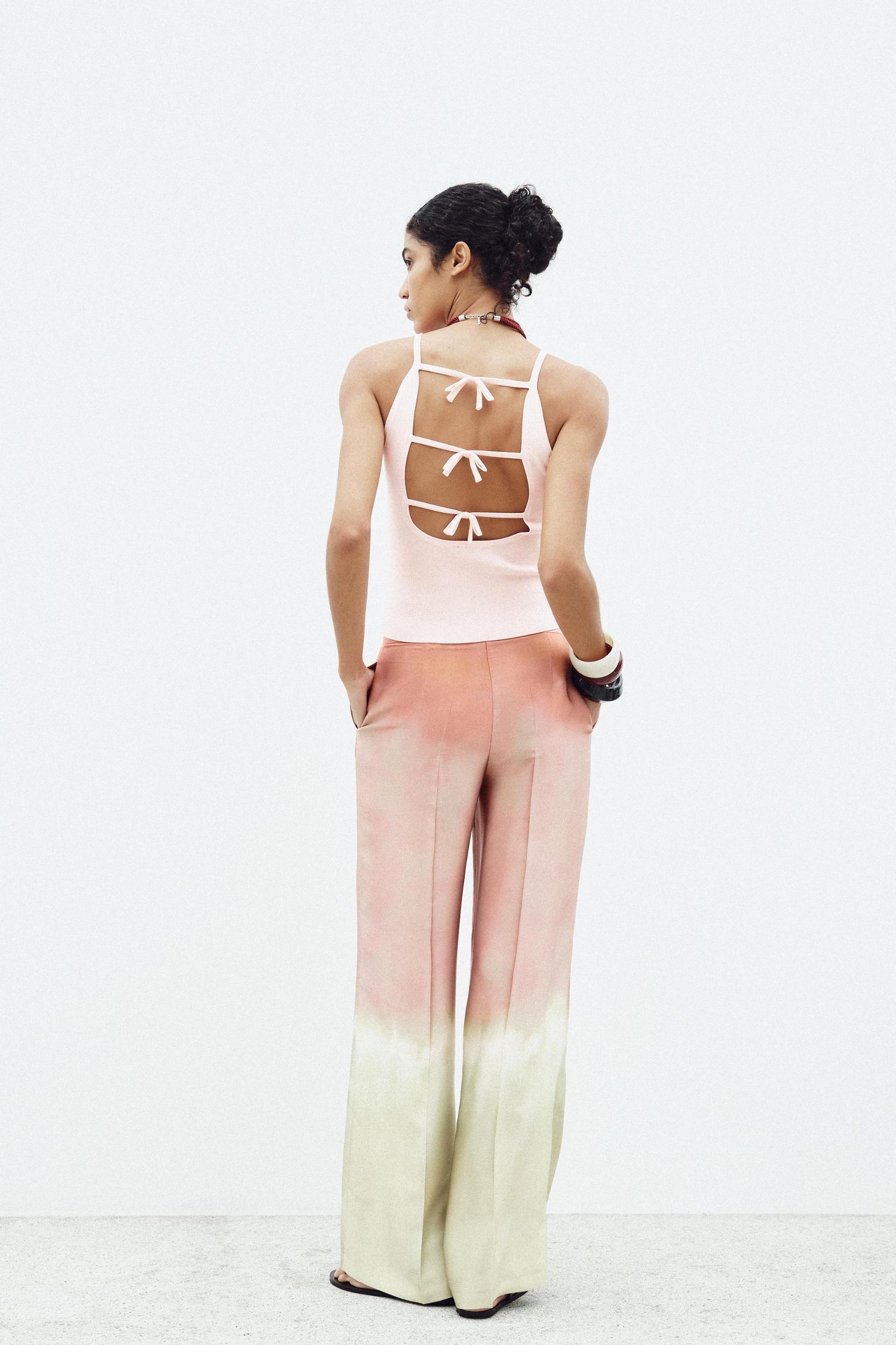 TIE CUT OUT KNIT TOP Product Image