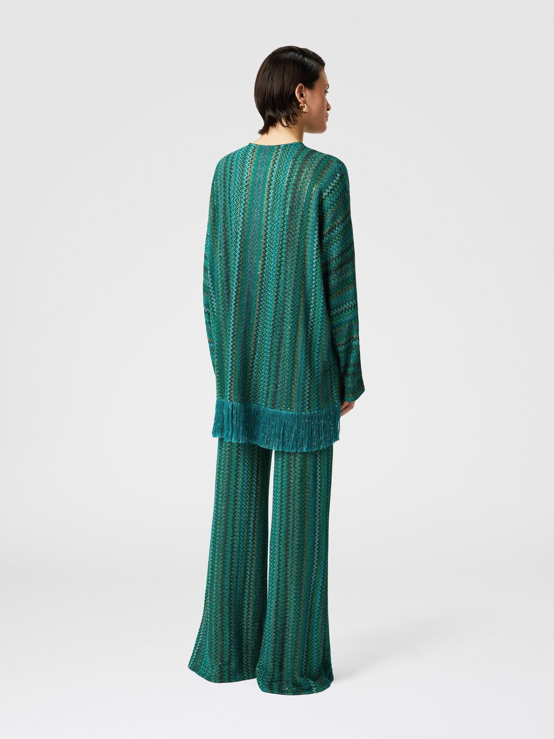 Zigzag long-sleeved blouse with sequins and fringes Product Image
