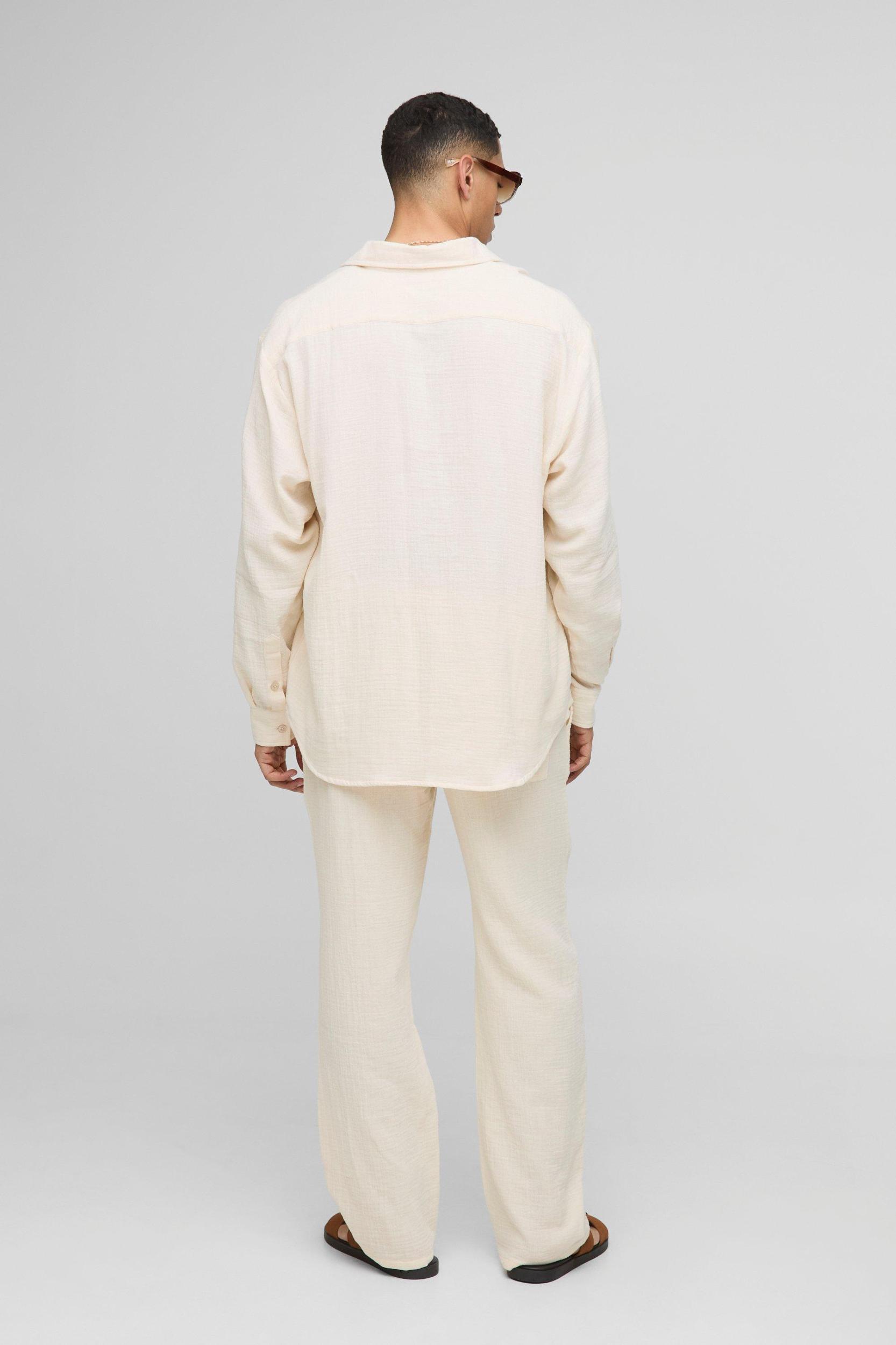 Elasticated Relaxed Fit Cheesecloth Trousers | boohooMAN USA Product Image
