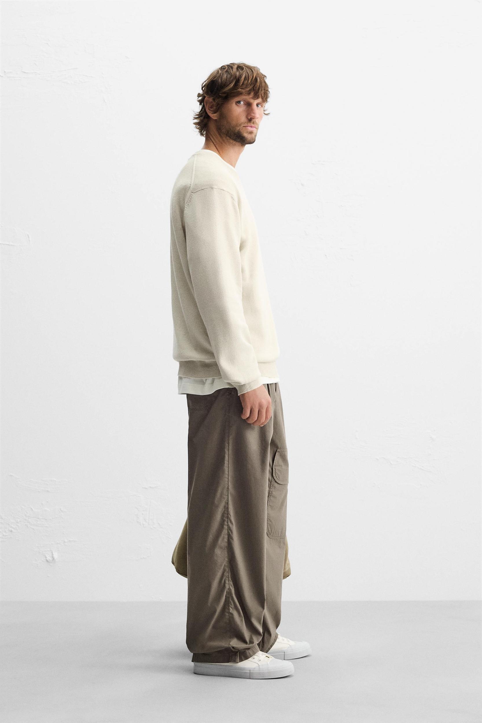 TEXTURED PLEATED PANTS Product Image