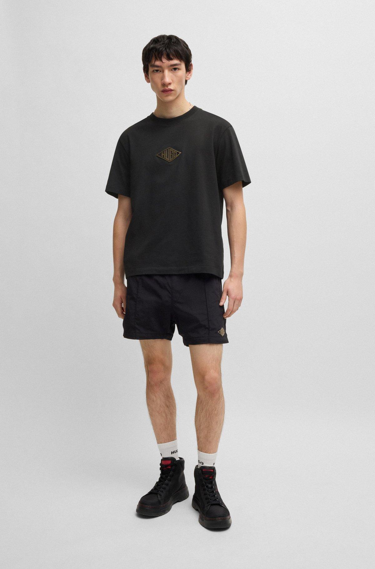Relaxed-fit T-shirt in cotton with embroidered logo Product Image