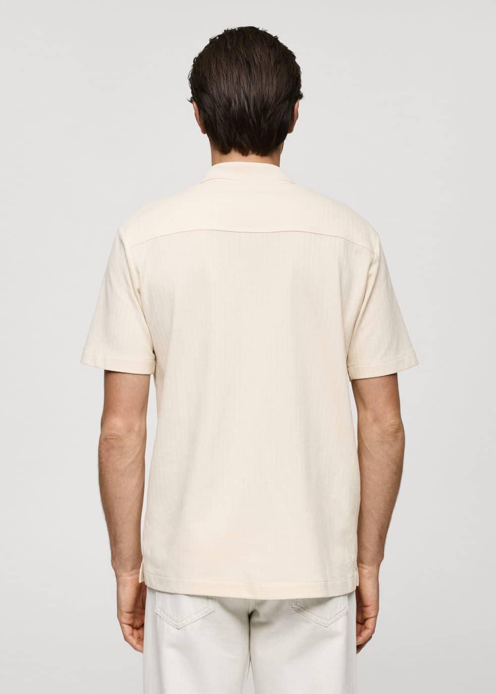 Regular-fit textured buttoned polo shirt - Men | MANGO USA Product Image
