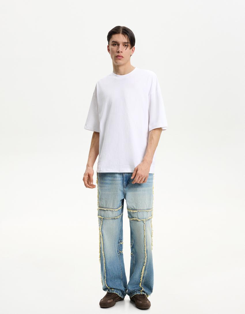 Baggy jeans with fringing Product Image