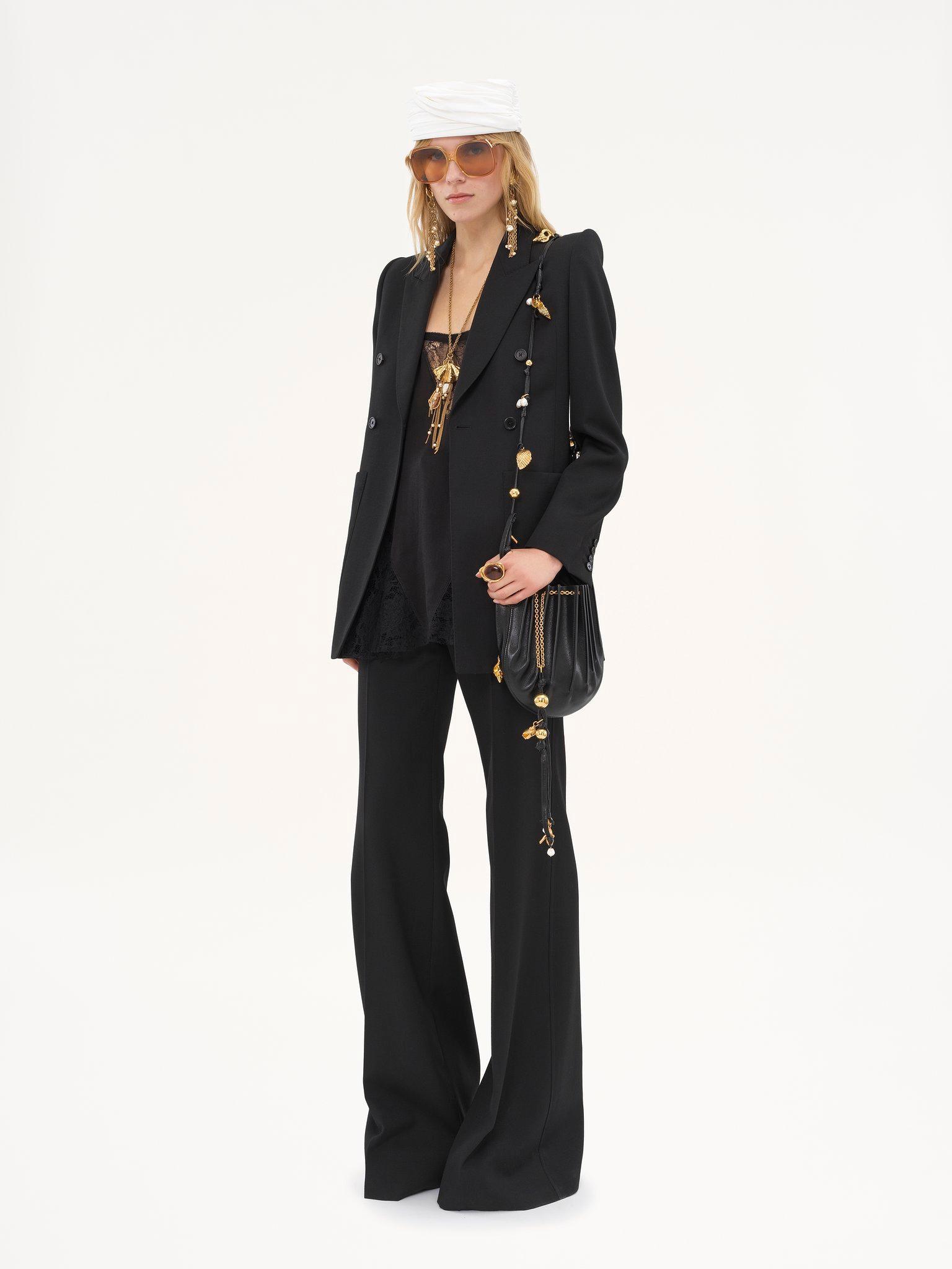 High-rise flared pants in wool grain de poudre Product Image