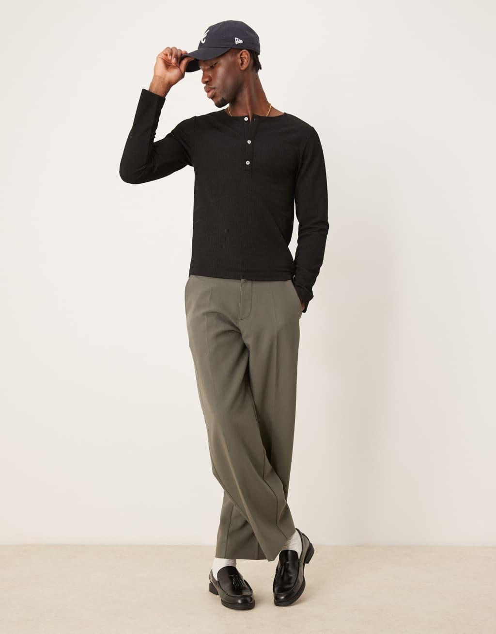 ASOS DESIGN muscle fit long sleeve boxy t-shirt with henley neck in black rib Product Image