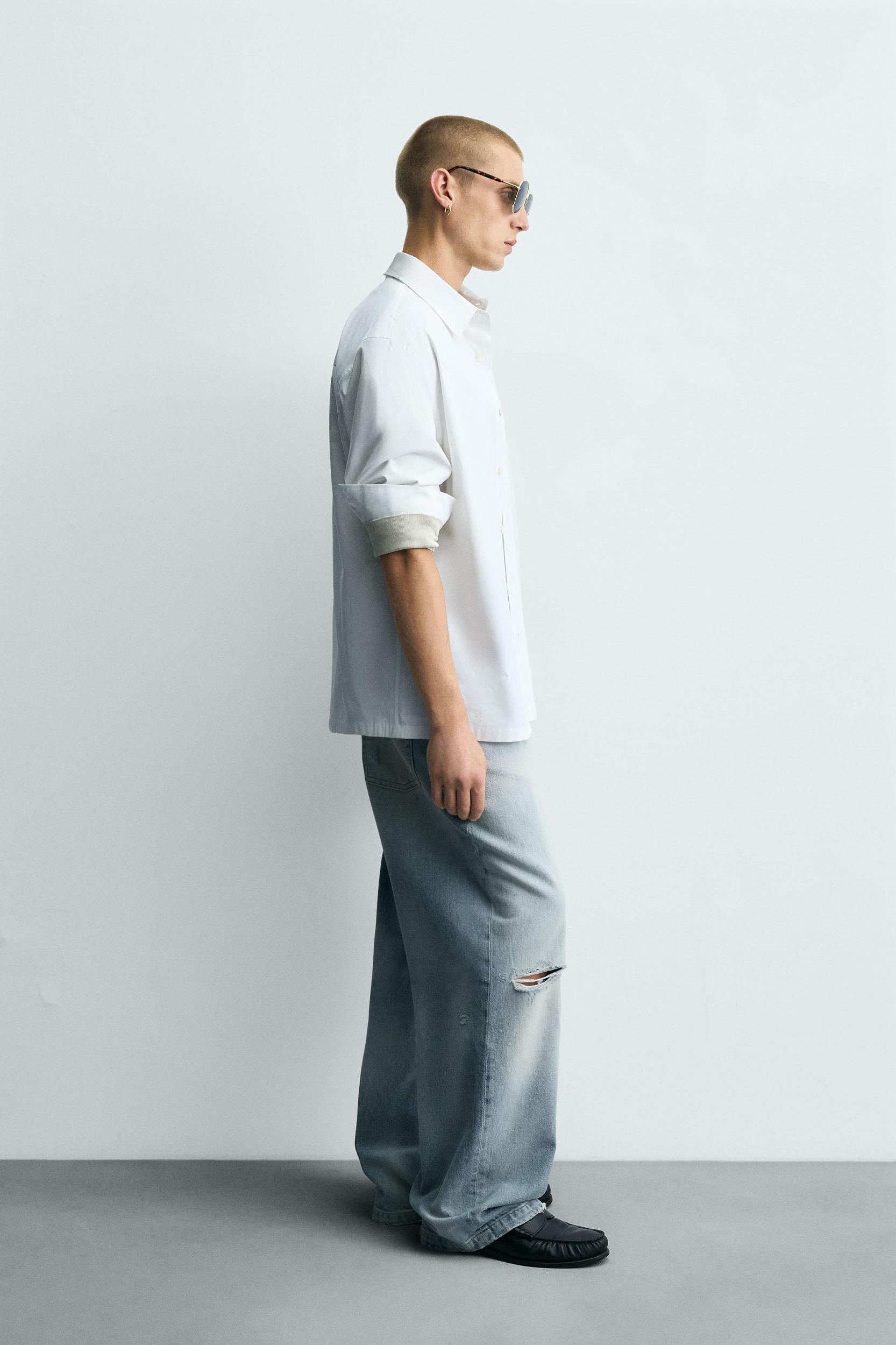 RIPPED BAGGY FIT JEANS Product Image