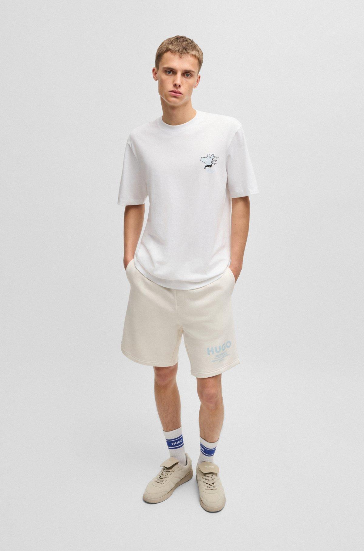 Cotton-jersey T-shirt with graphic prints Product Image