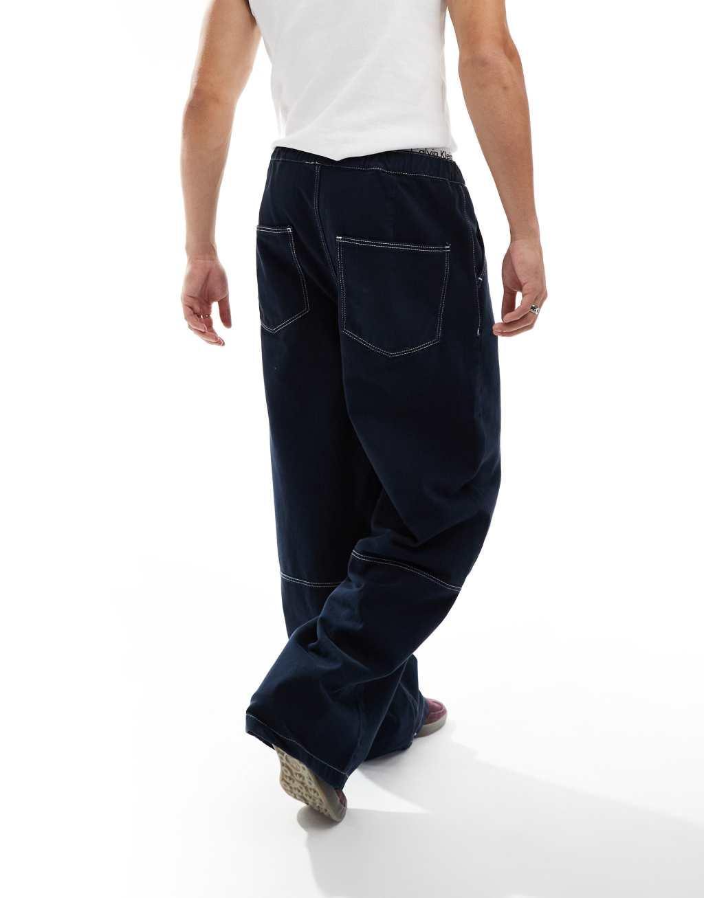 ASOS DESIGN super baggy jeans in white with elastic waistband Product Image