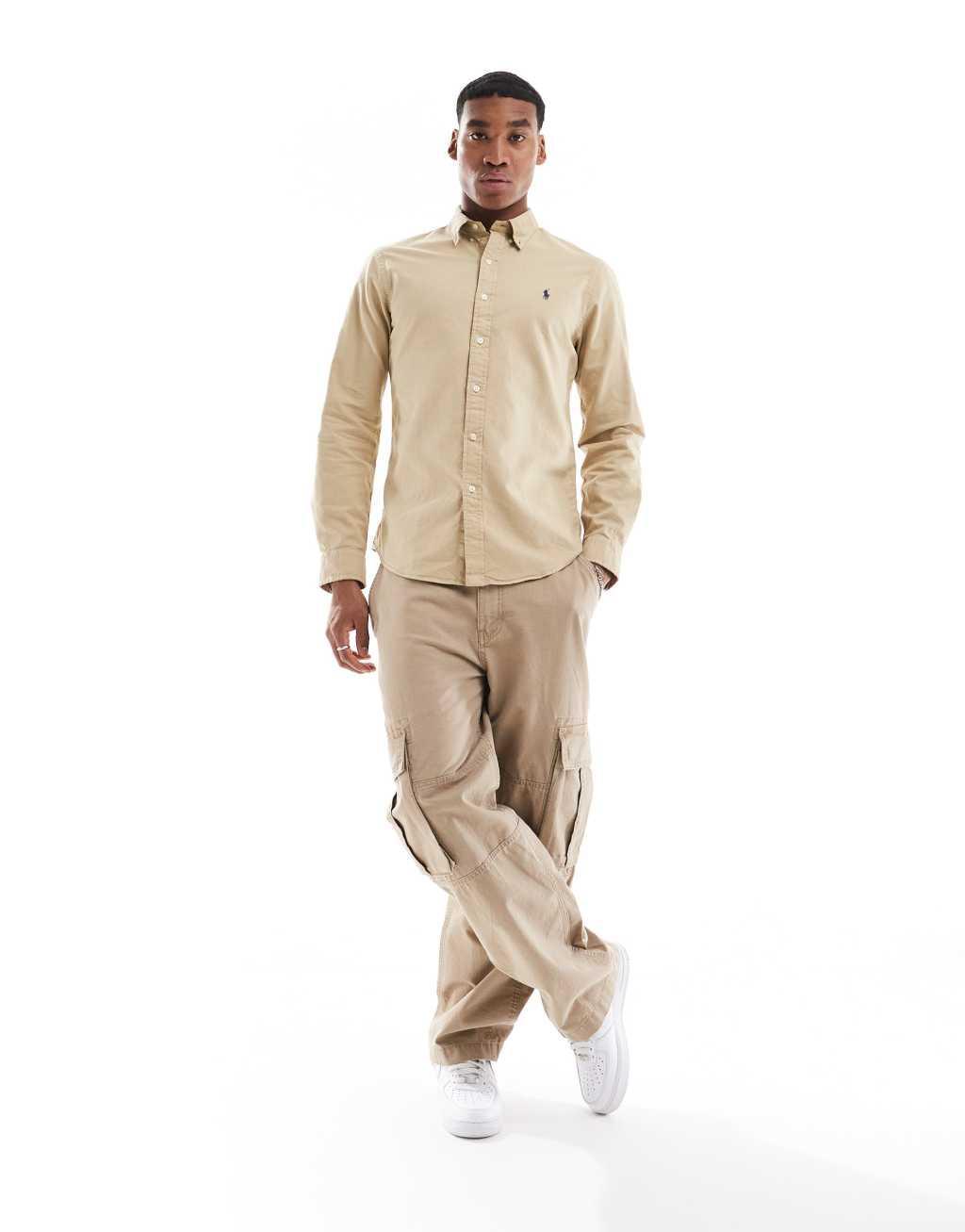 Polo Ralph Lauren icon logo slim fit garment dyed oxford shirt in beige Product Image