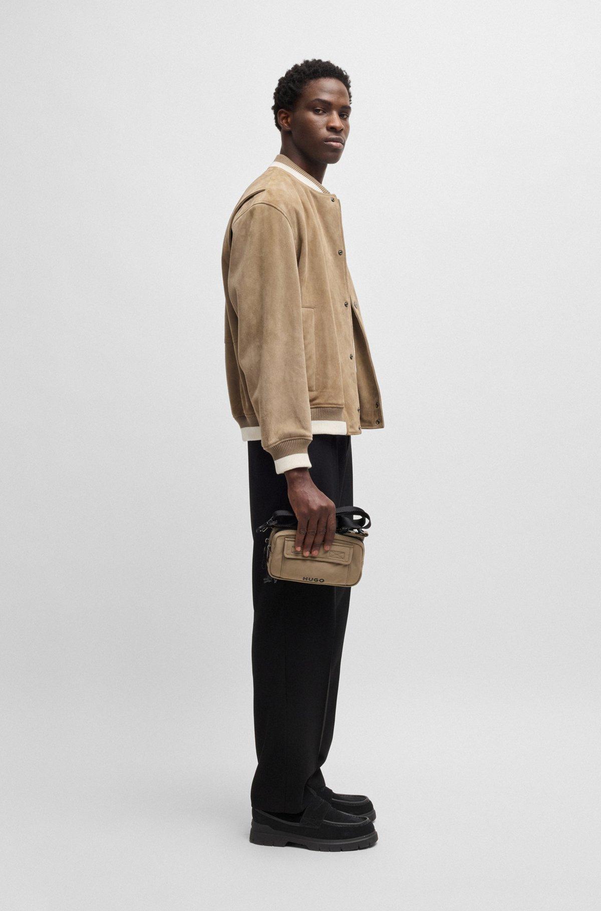 Multi-pocket crossbody bag with contrast branding Product Image
