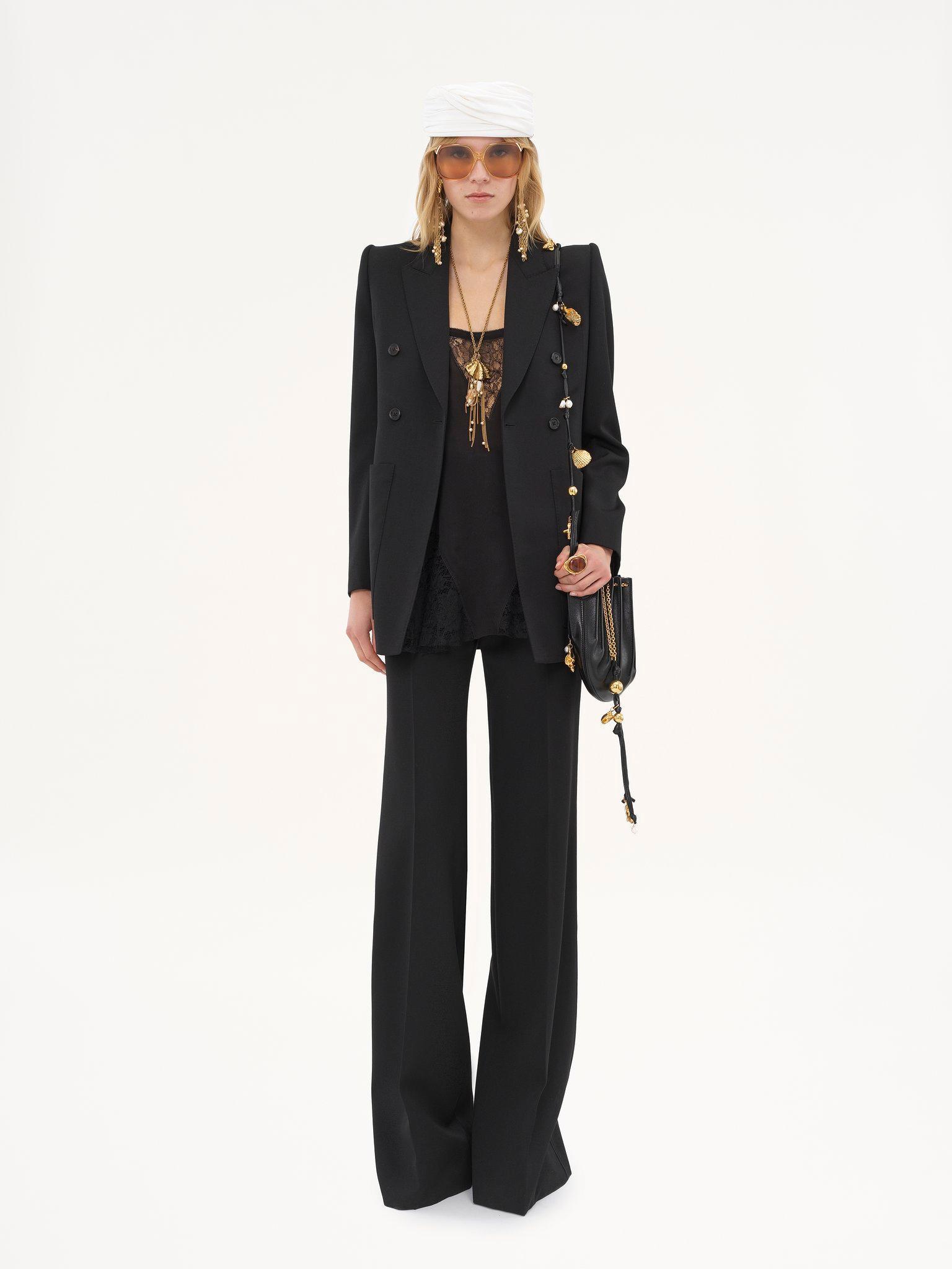 High-rise flared pants in wool grain de poudre Product Image