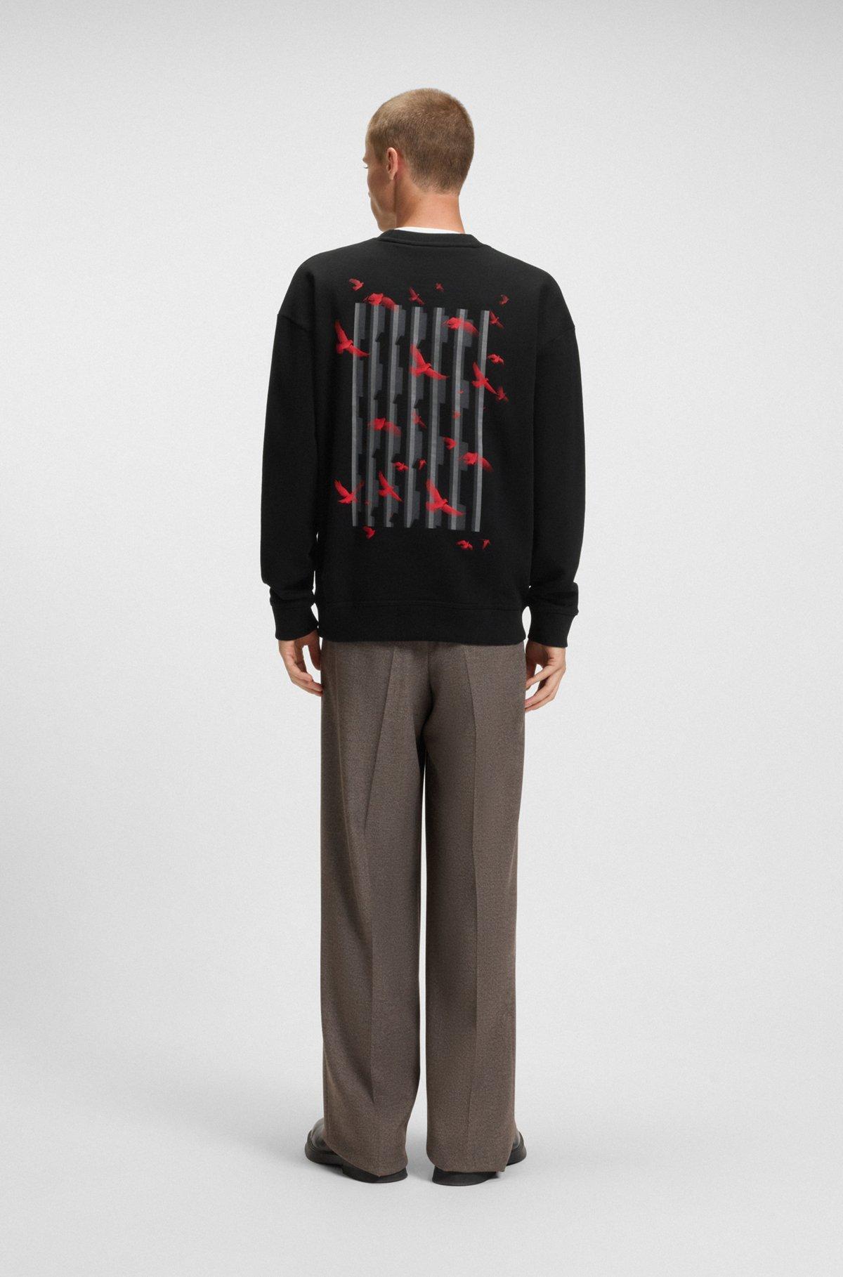 HUGO - Cotton-terry sweatshirt with bird artwork - Black Product Image