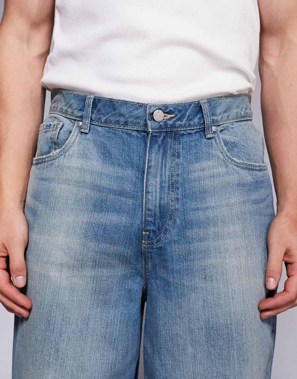 ASOS DESIGN horseshoe jeans in light wash blue Product Image